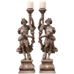 Pair of 19th Century Italian Carved and Grey Painted Figure Candlesticks