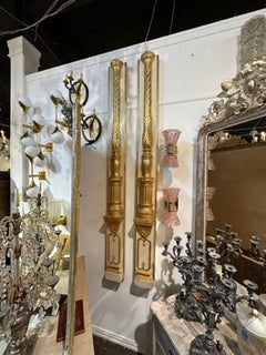 Pair of 19th Century Italian Carved and Parcel Gilt Columns