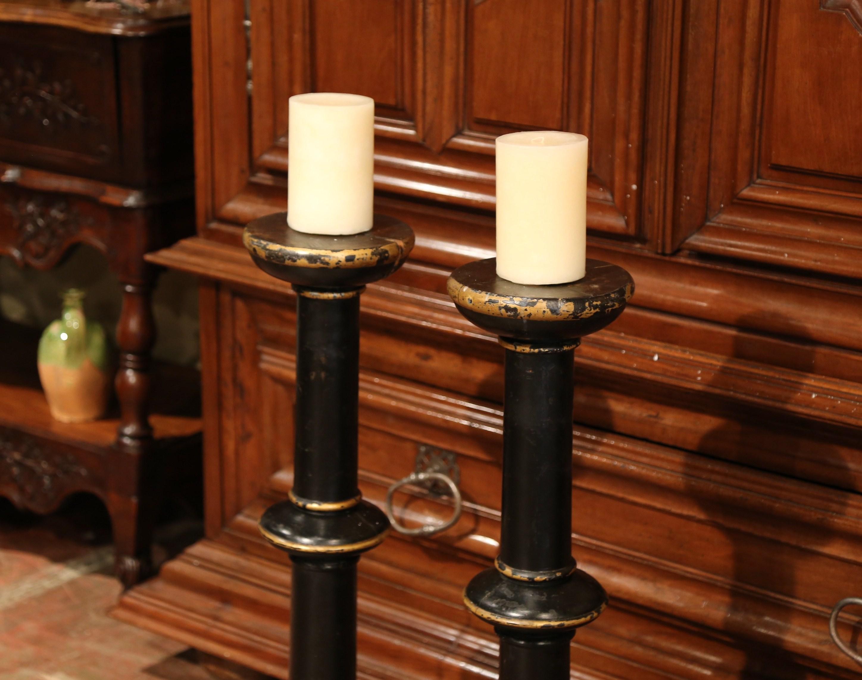 Hand-Carved Pair of 19th Century Italian Carved Blackened and Gilt Candlesticks For Sale