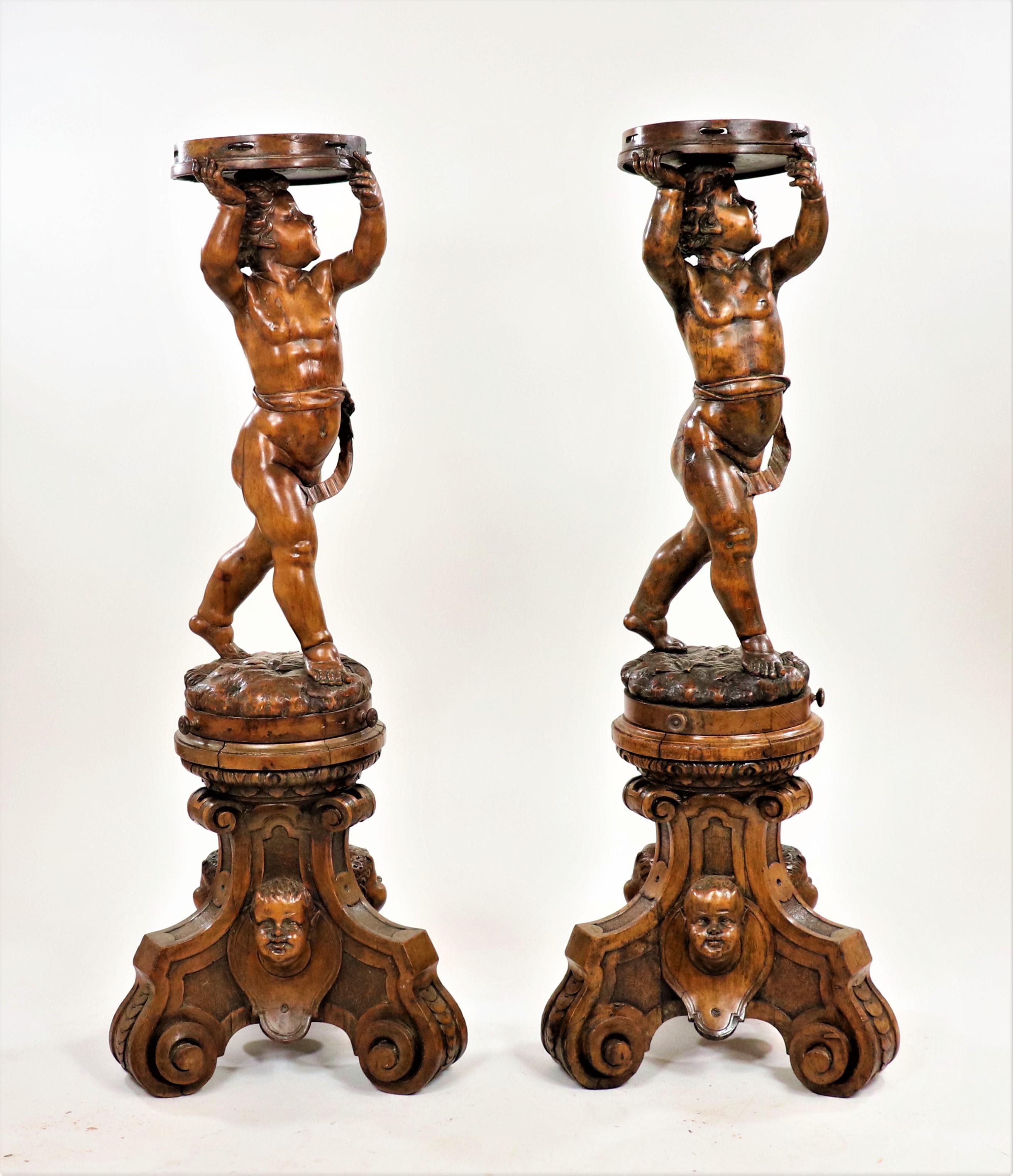 Meticulously carved from beechwood, this cherub pair recalls the iconic Renaissance style of the fifteenth and sixteenth centuries. Better recognized by their Italian name, putti—the singular putto refers to the Latin putus, meaning “boy” or