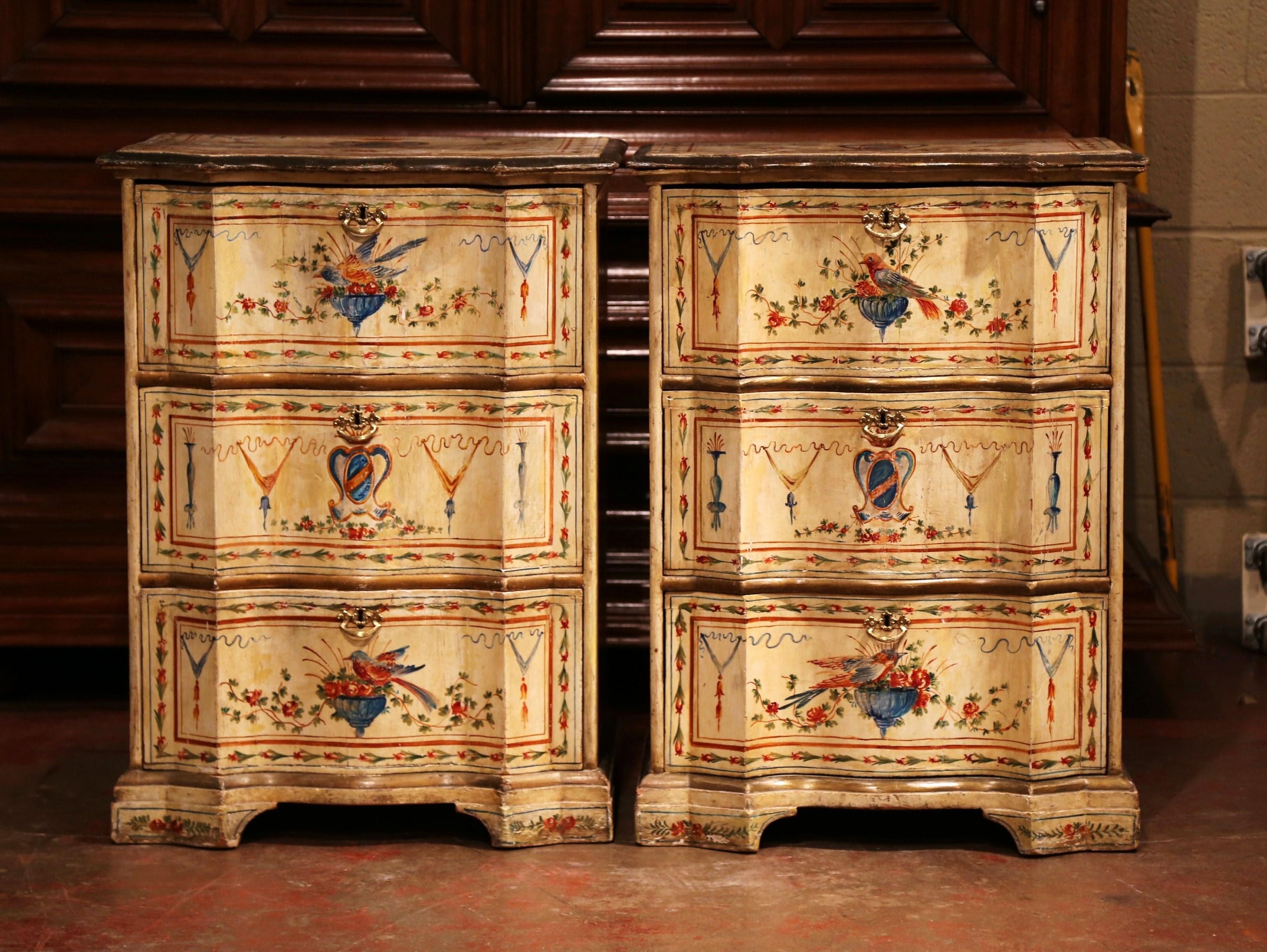 Place this elegant pair of antique bedside tables on either side of a king or queen bed for extra storage space in your bedroom. Created in Italy, circa 1860, each ornate commode stands on four square feet, and features three serpentine drawers