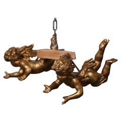 Pair of 19th Century Italian Carved Giltwood Winged Cherub Wall Sculptures