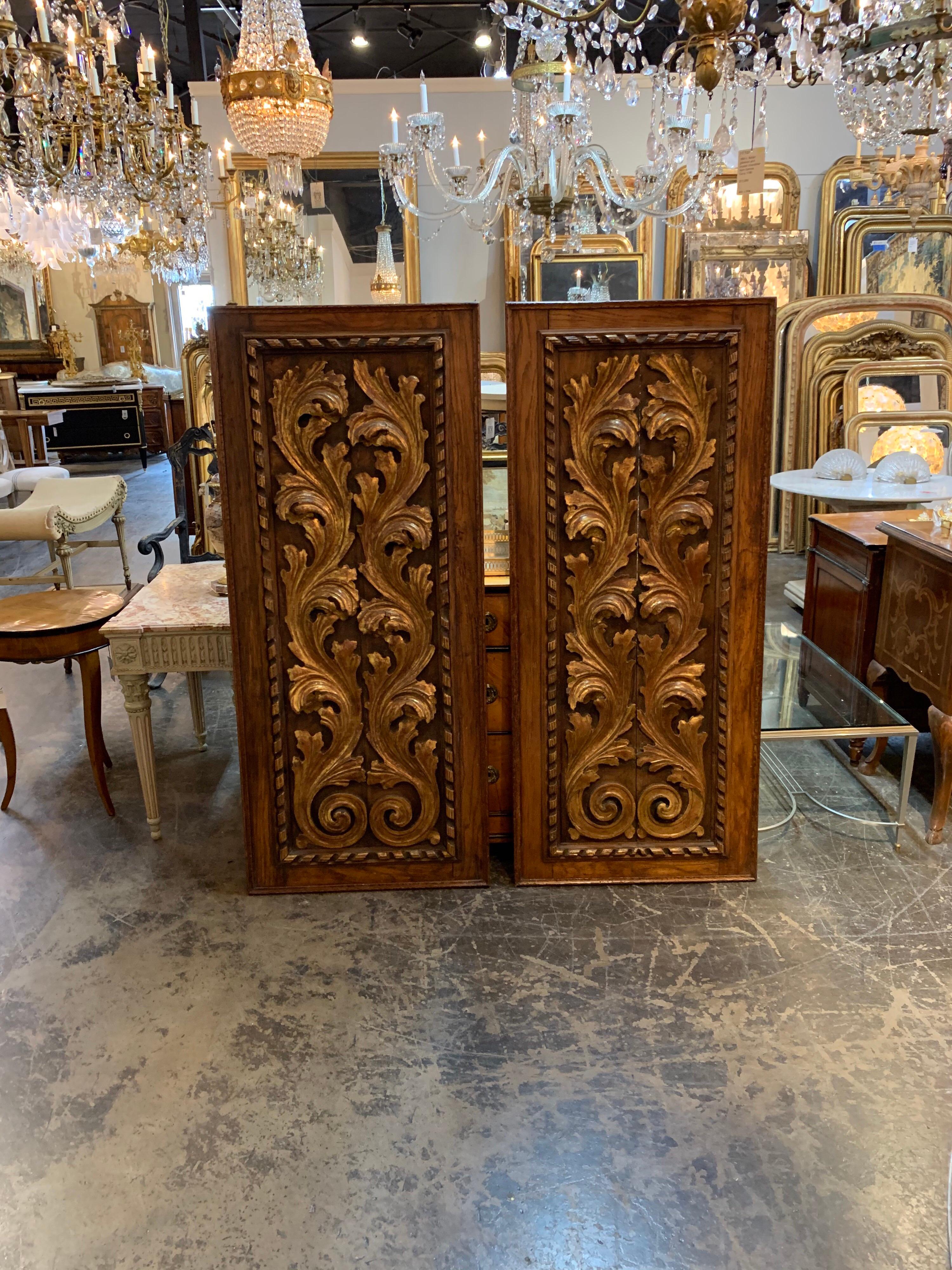 Handsome pair of large 19th century Italian carved oak Baroque panels. Exceptional carvings on a rich brown panel. A beautiful design element!