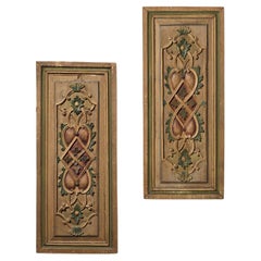 Coppia di pannelli dipinti e intagliati del XIX secolo