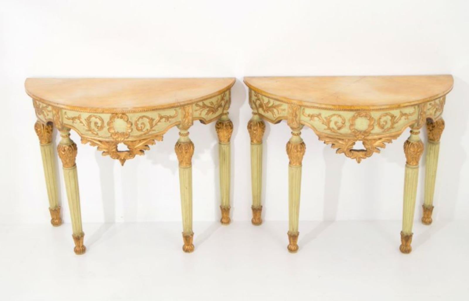 Pair of 19th century Italian console tables
90x117x55cm
Half-moon console in carved, lacquered and gilded wood.
Good condition for the age.