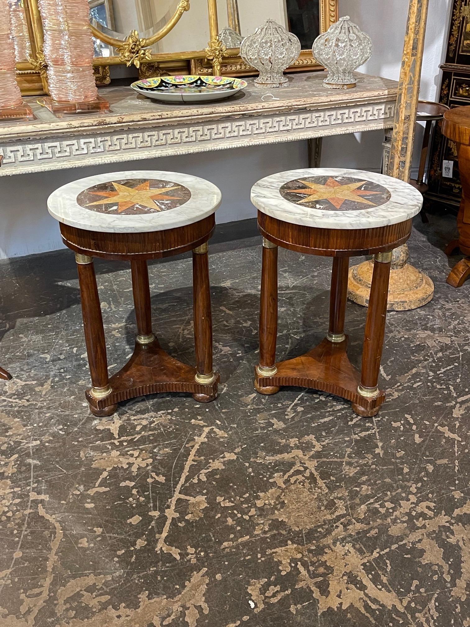 Handsome pair of 19th century Italian Empire style walnut side tables. Beautiful marble tops with pretty star pattern. Creates a very stylish look!!