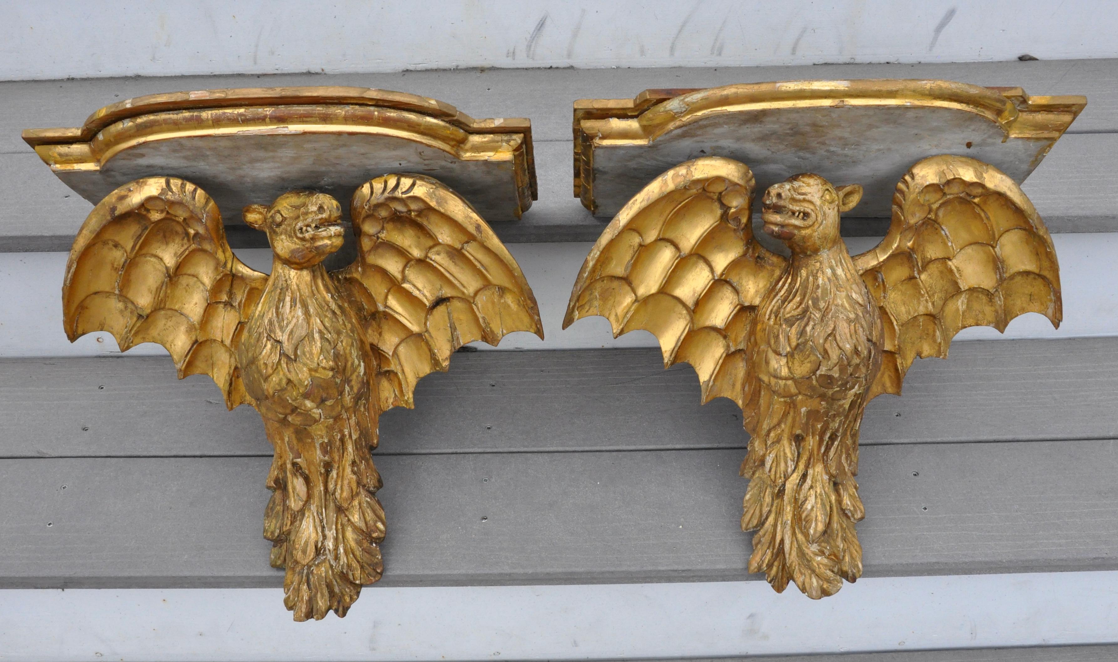 Pair of rare 19th century Italian carved and gilt wood bat form wall brackets. Original gilding. As found. Rare and wonderful.

Neoclassical and Gothic, in time for Halloween.