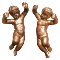 Pair of 19th Century Italian Giltwood Wall-Hanging Cherub Sculptures