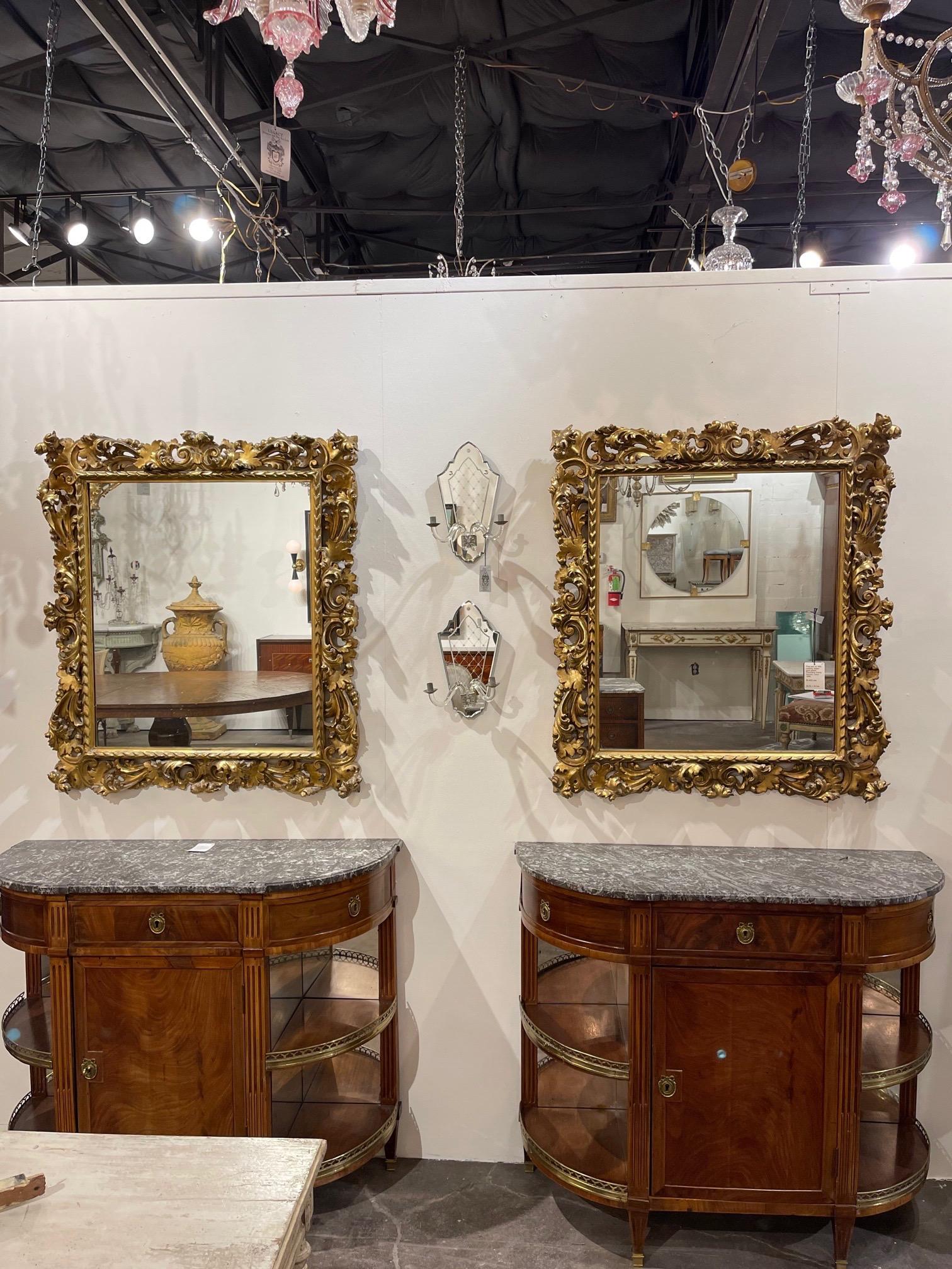 Very fine pair of 19th century Italian gold gilded Florentine framed mirrors. Beautiful scrolling patterns on these. Extremely elegant!