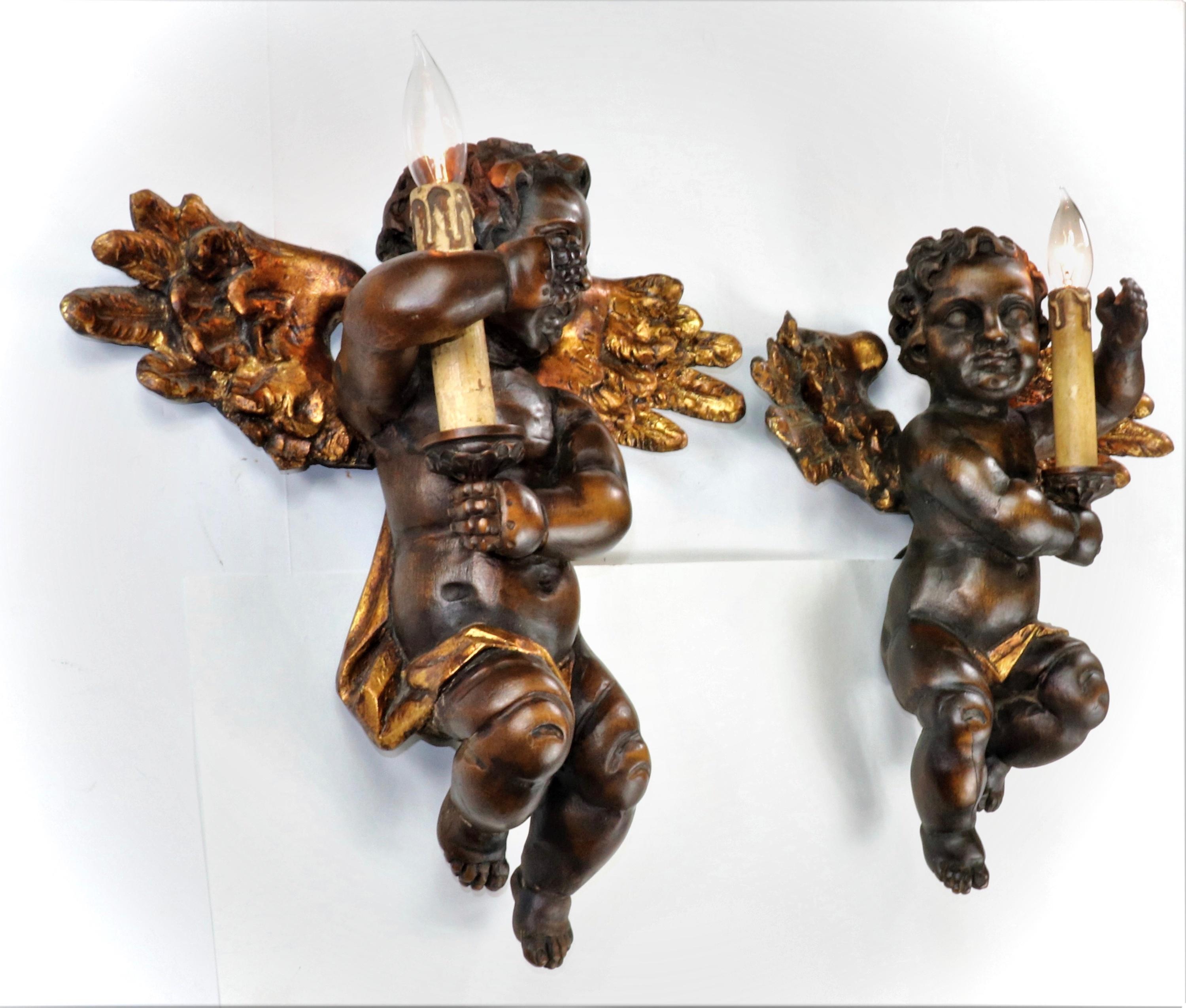 Patinated Pair of 19th Century Italian Hand Carved Angel Cherub Sconces For Sale