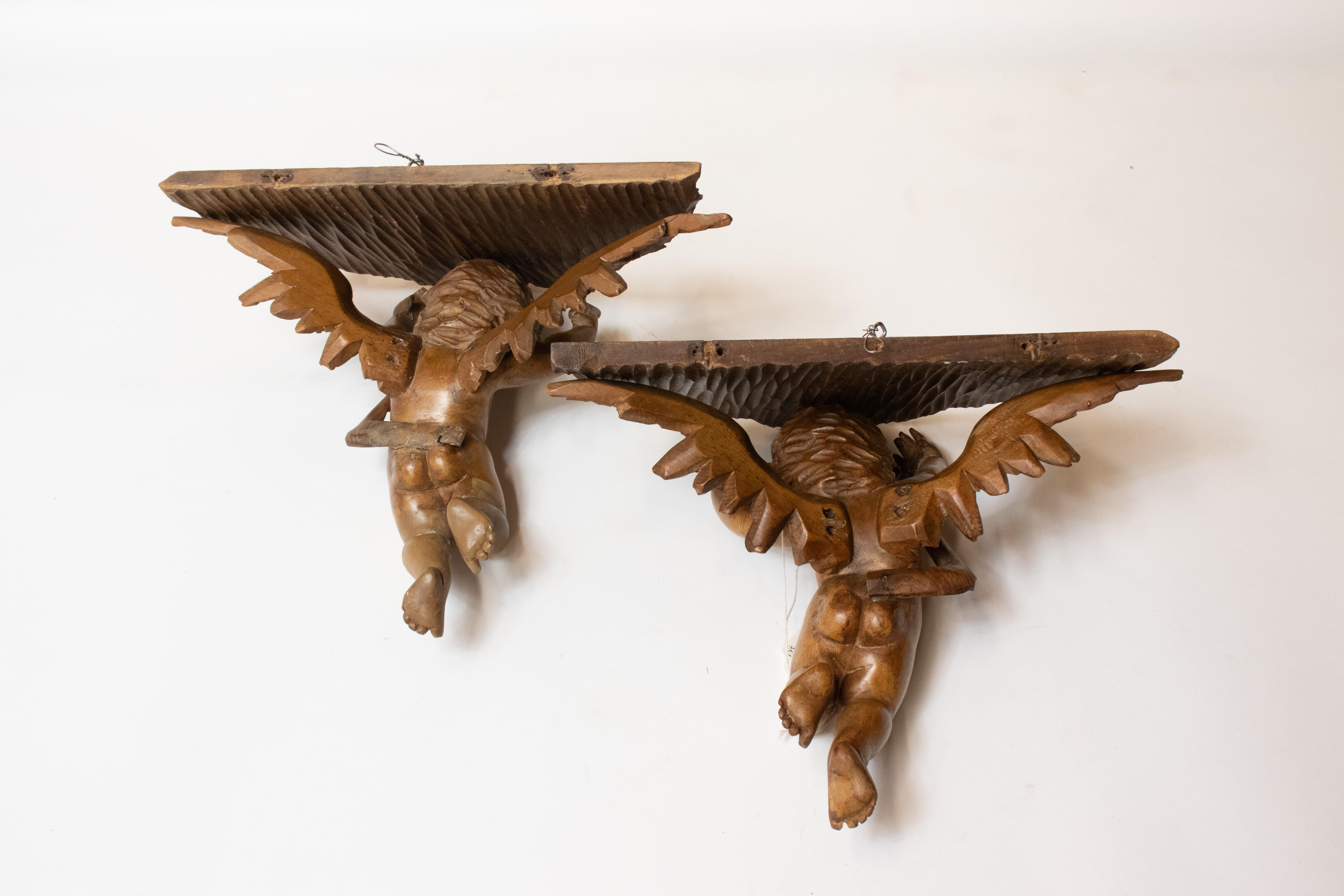 Pair of 19th Century Italian Hand Carved Walnut Brackets with Angels In Good Condition In Chicago, IL