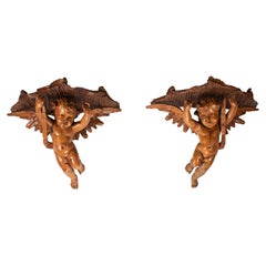 Pair of 19th Century Italian Hand Carved Walnut Brackets with Angels