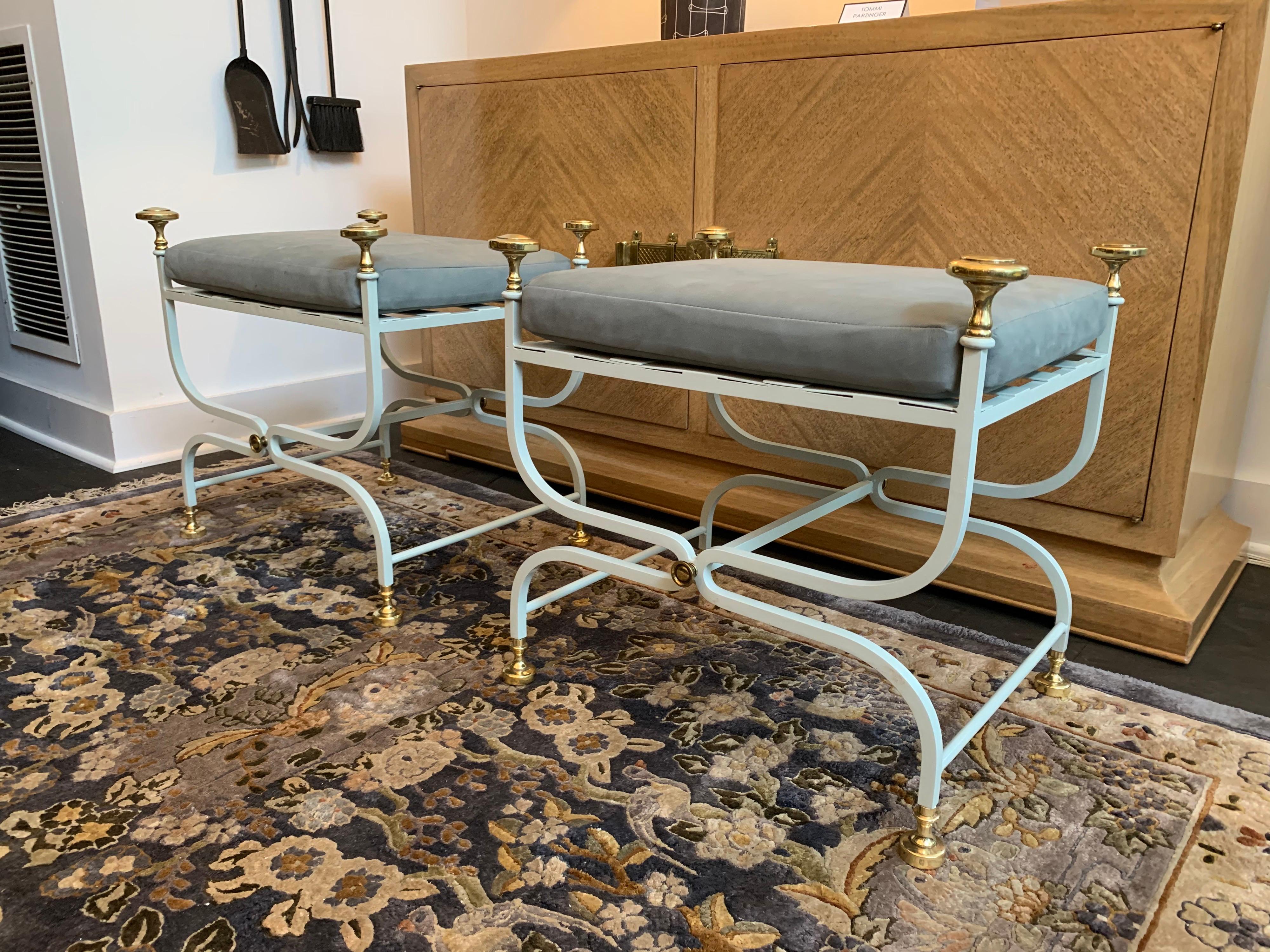 Powder-coated iron in a soft powder blue tone with brass accents throughout. The recently upholstered cushions in a super soft calfskin leather match the coloring of the benches. See detailed images.