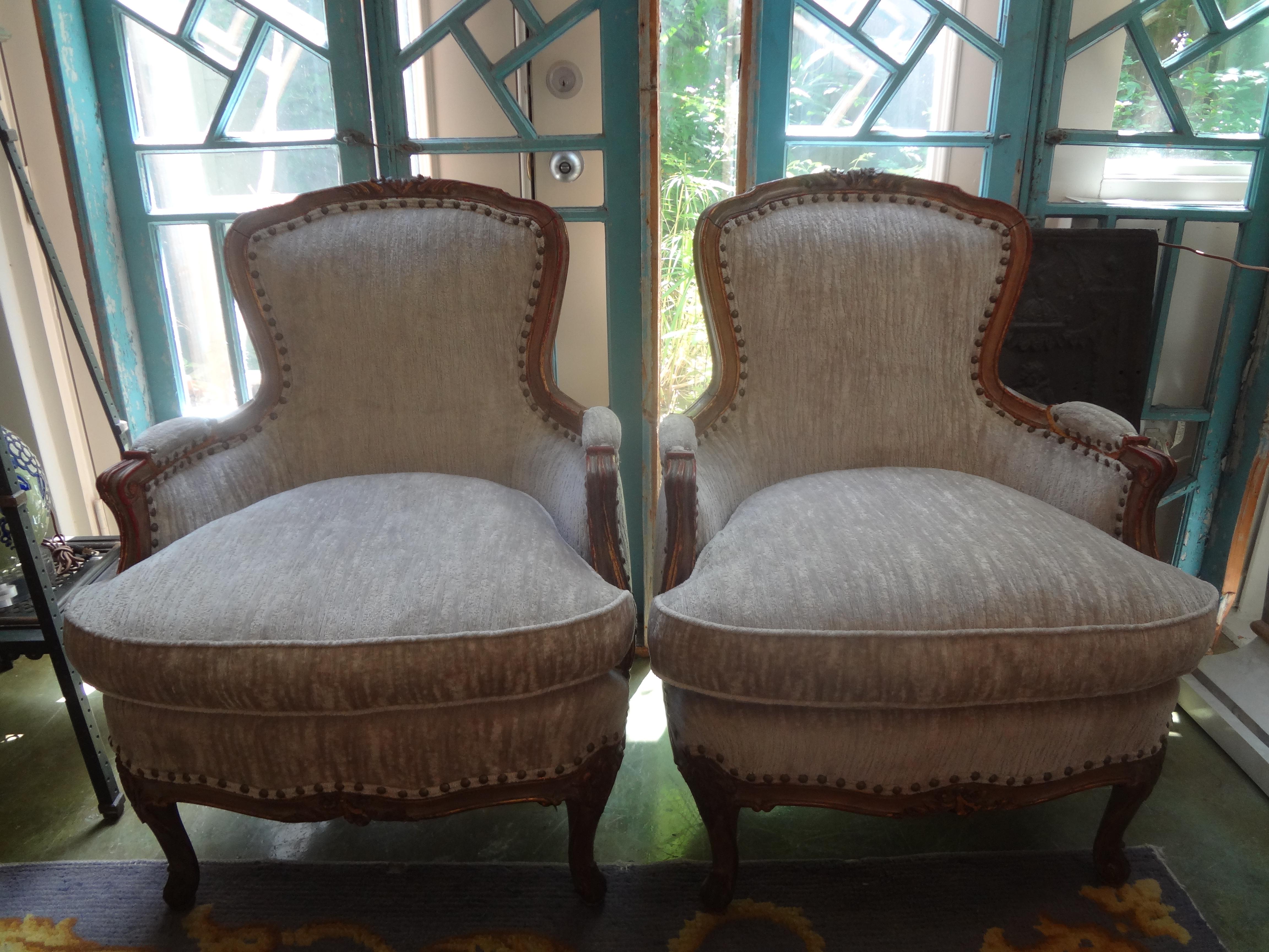 Pair of 19th century Italian Louis XV style Bergères.
Stylish and comfortable best describe this beautiful pair of antique Italian chairs. This pair of Italian bergères, lounge chairs or side chairs have the most gorgeous patina and were taken down