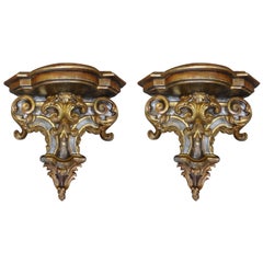 Coppia di mensole da parete in legno dorato e dipinto italiano del XIX secolo