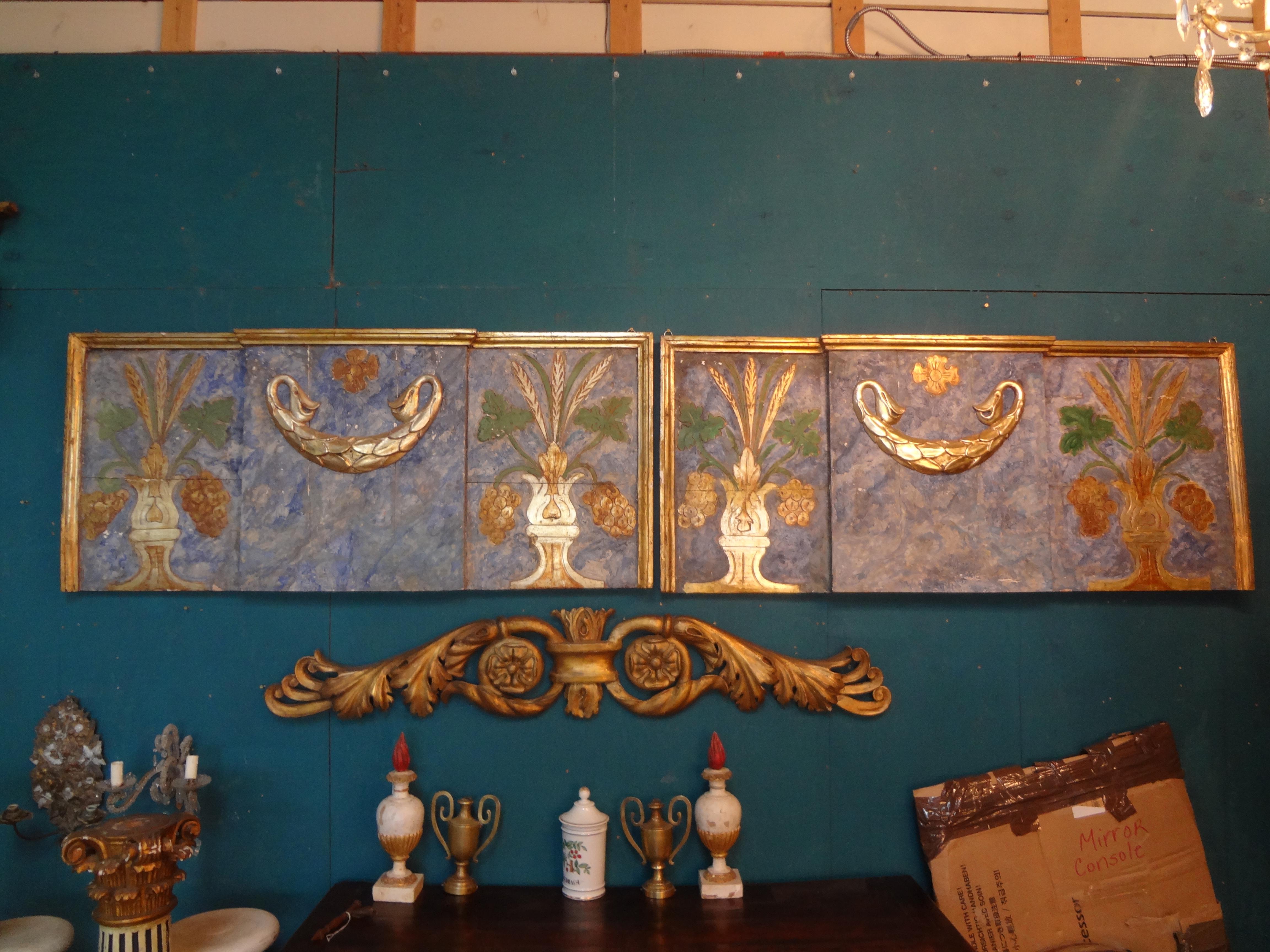 Stunning large pair of 19th century Italian painted and parcel gilt architectural panels. These beautifully detailed Italian neoclassical style architectural elements or wall panels or wall sculptures are decorated in a lovely color