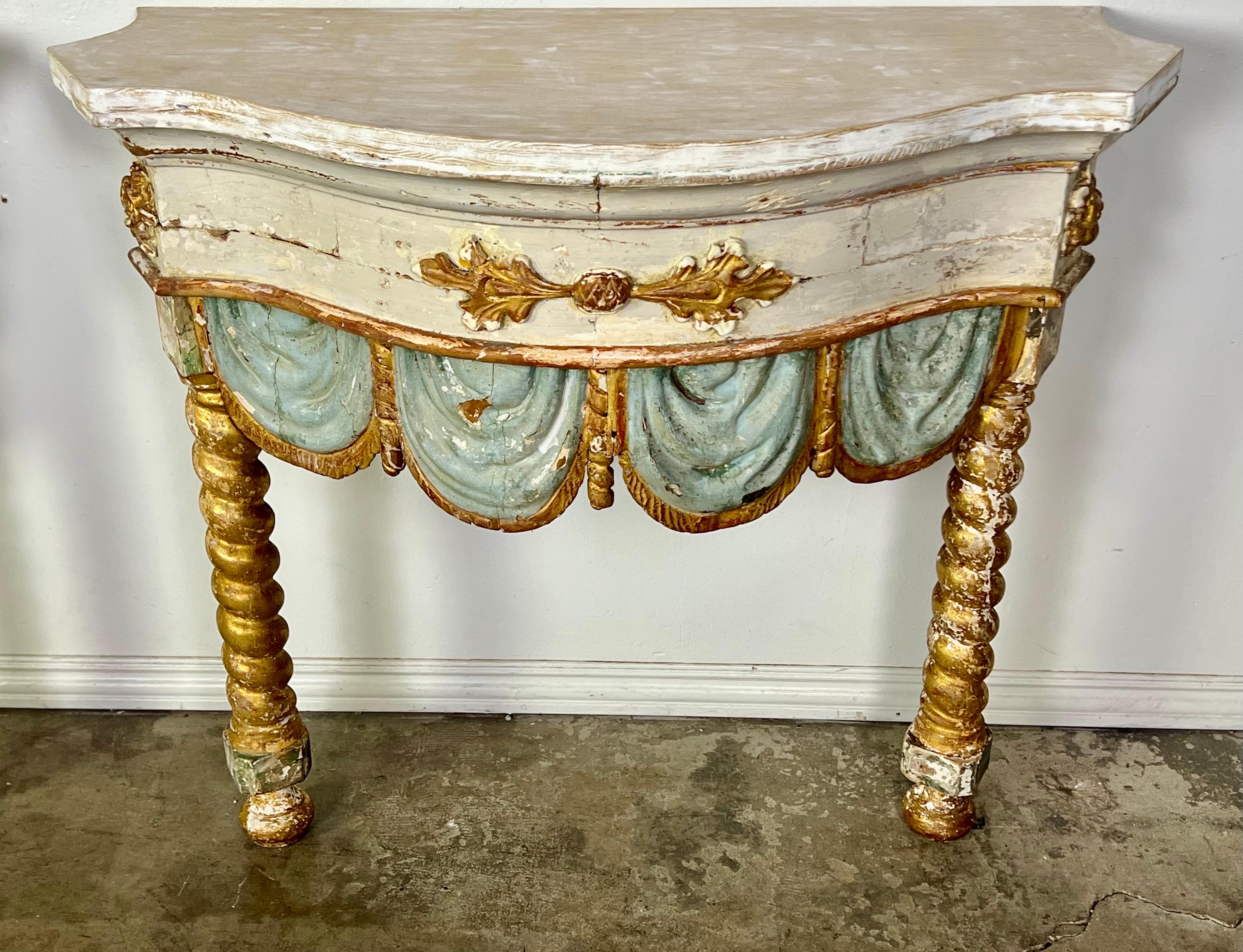 Rococo Pair of 19th century Italian Painted and Parcel Gilt Consoles For Sale