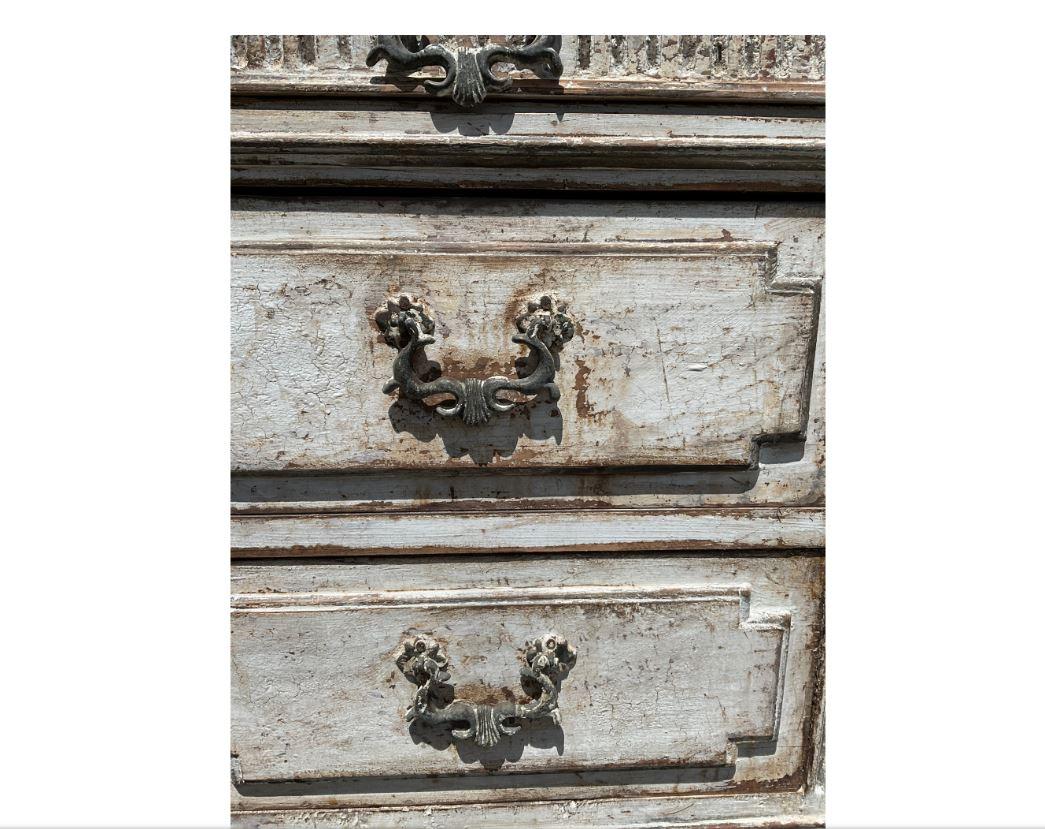 These stunning Italian painted chests come as a matching set. They date to the early 19th century, and have developed excellent age and patina! The chests are a combination of grey, white and darker tones with original hardware as well. This set
