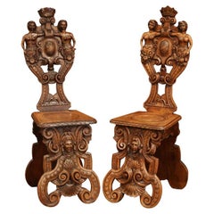 Pair of 19th Century Italian Renaissance Carved Walnut Sgabello Hall Chairs
