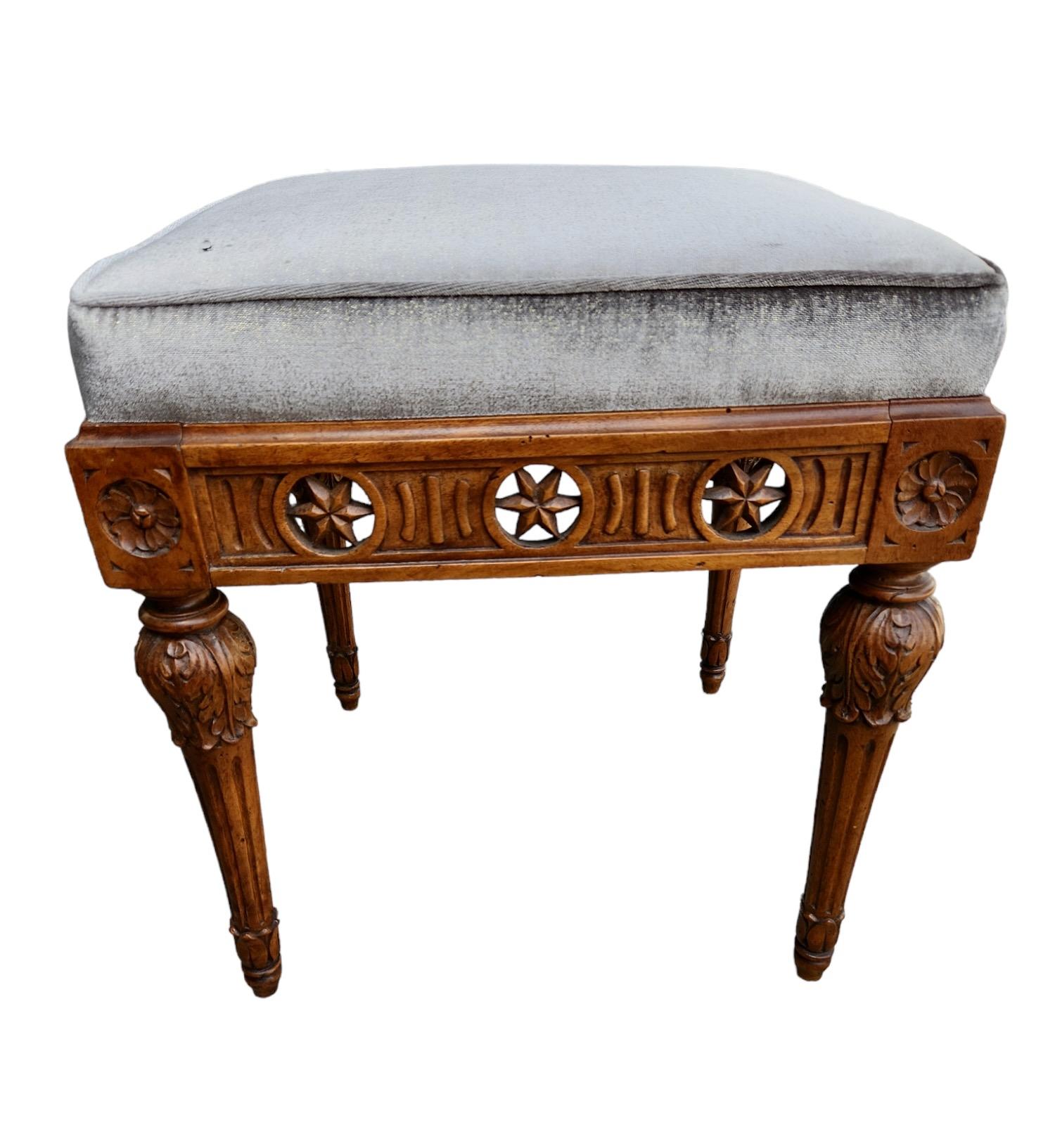 Finely carved 19th century Italian Walnut benches. Newly upholstered in a glamorous silk velvet with a dusting of gold in the fabric. Strong and sturdy.