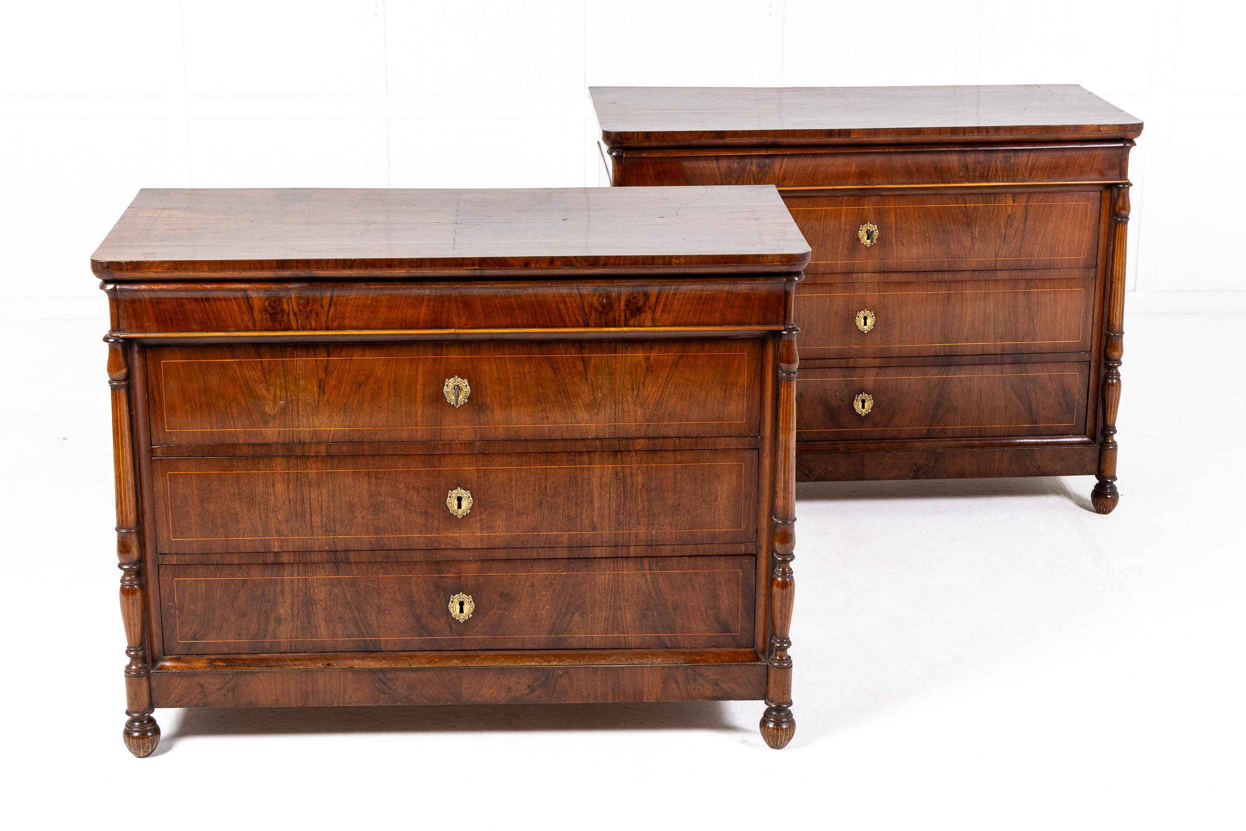 A Very Fine Pair of Early 19th Century Italian Walnut Commodes c.1820

Of broadly rectangular shape but with sophisticated detailing throughout, these pieces employ walnut veneers of the finest quality. The bookmatched and crossbanded tops of these