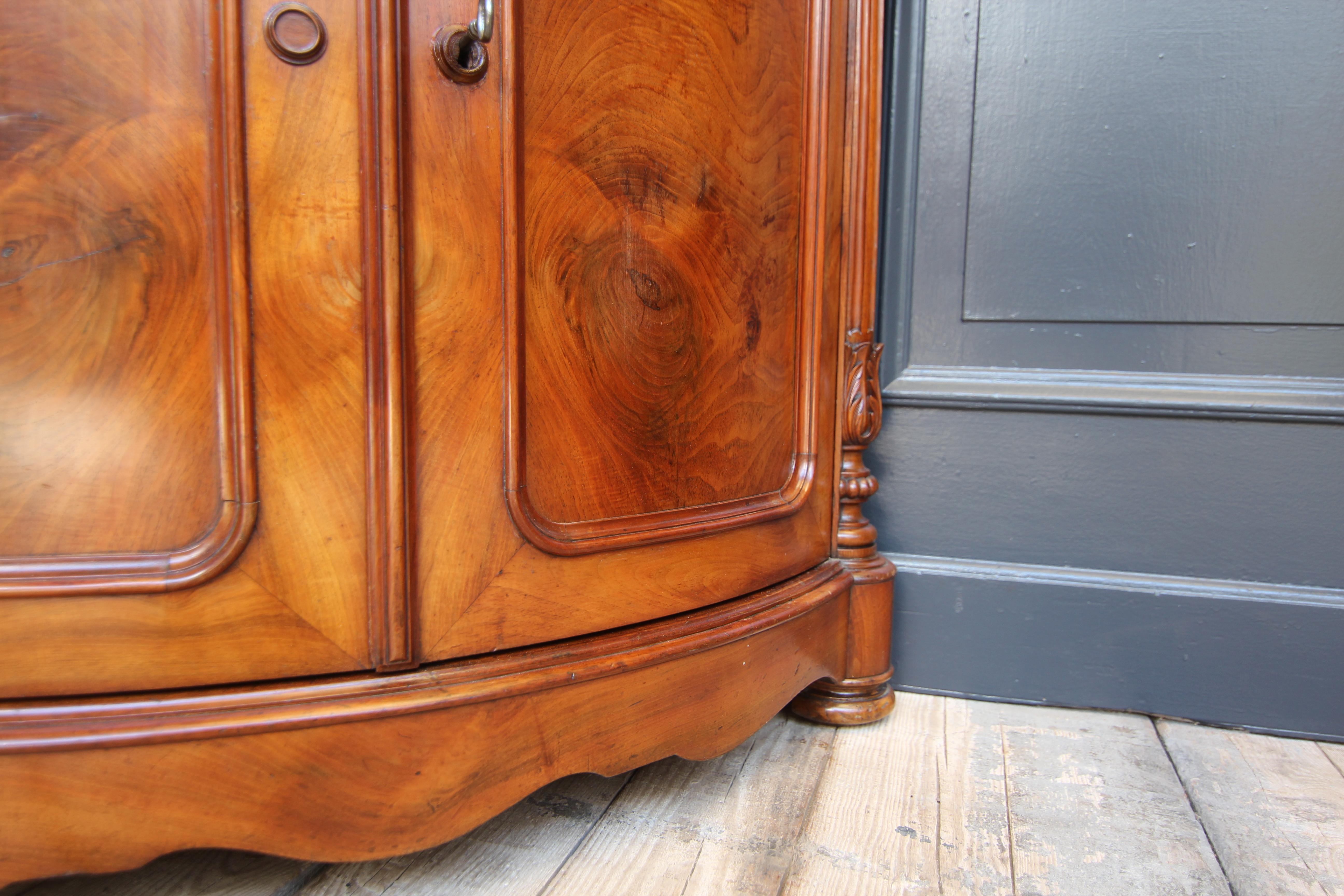 Nutwood Pair of 19th Century Louis Philippe Bow Front Corner Cabinets For Sale