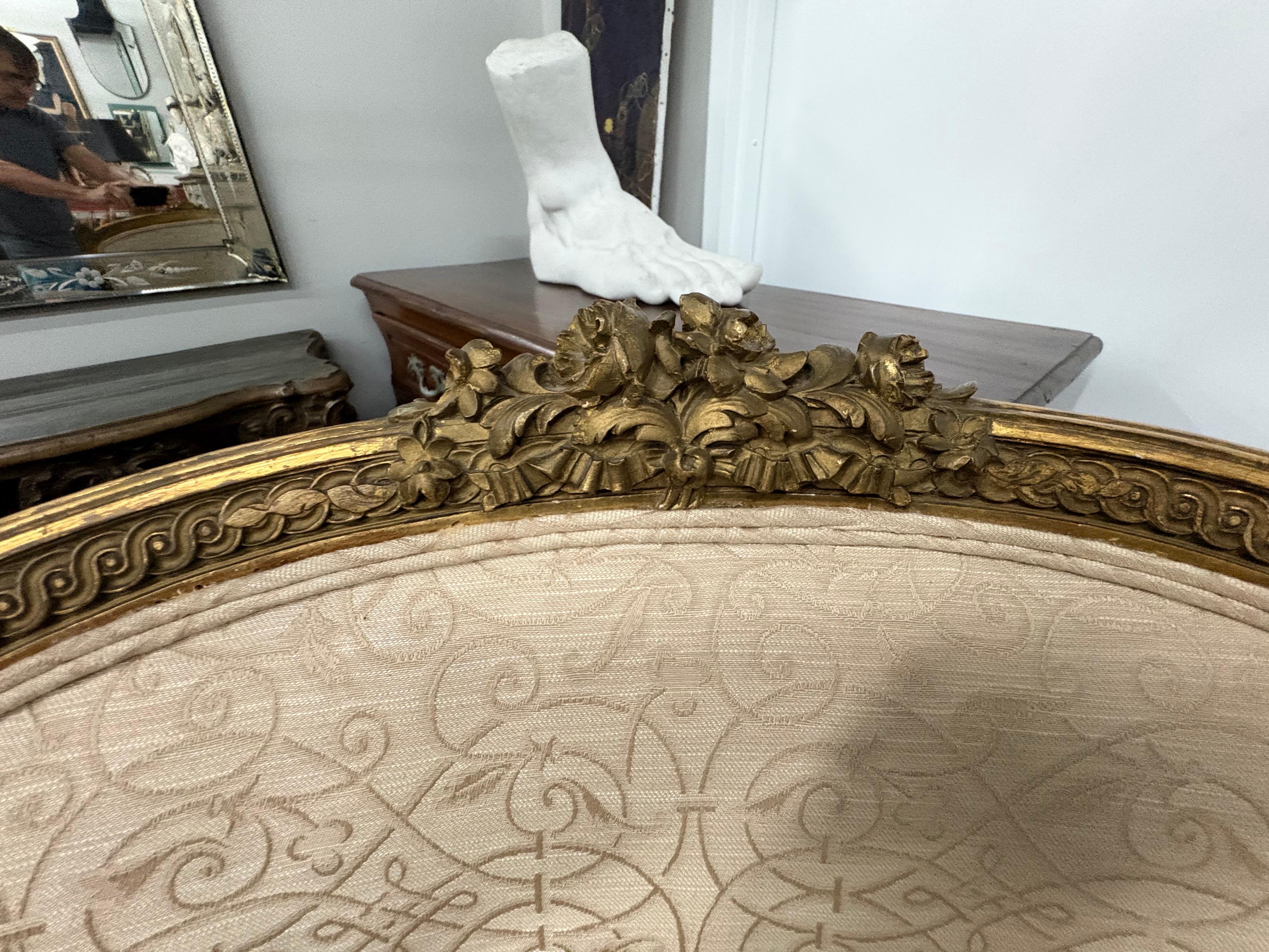 Pair Of 19th Century French Louis XV Style Giltwood Bergeres.
Offered is a fantastic pair of 19th century French Giltwood Bergeres, chairs or side chairs.
This pair of antique French chairs is both stylish and comfortable. Generous size for larger