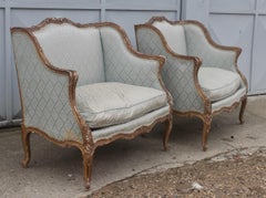 Pair of 19th Century Louis XV Style Giltwood Marquises after J-B Tilliard