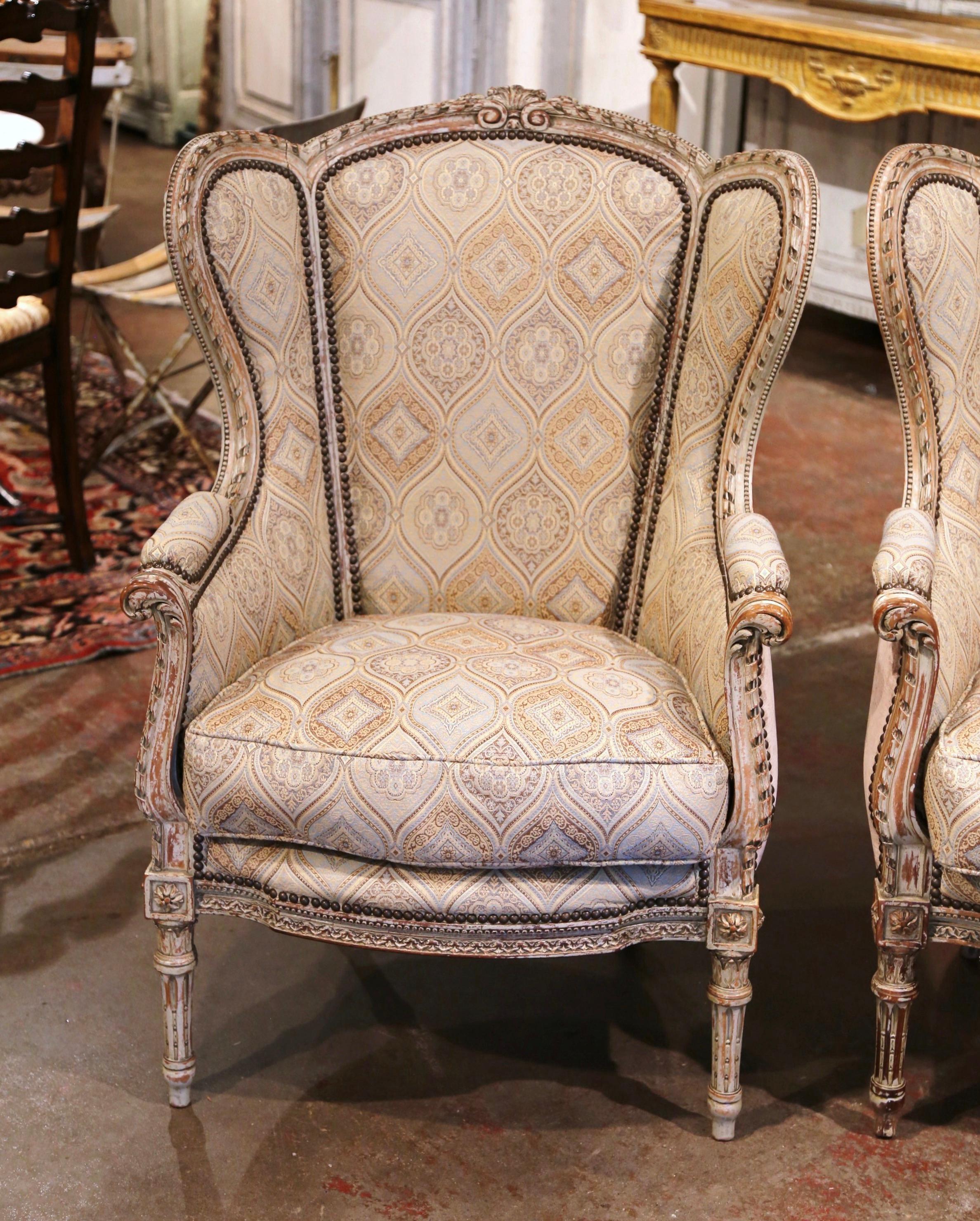 Dress a living room with this elegant pair of antique armchairs. Crafted in France circa 1870, each 