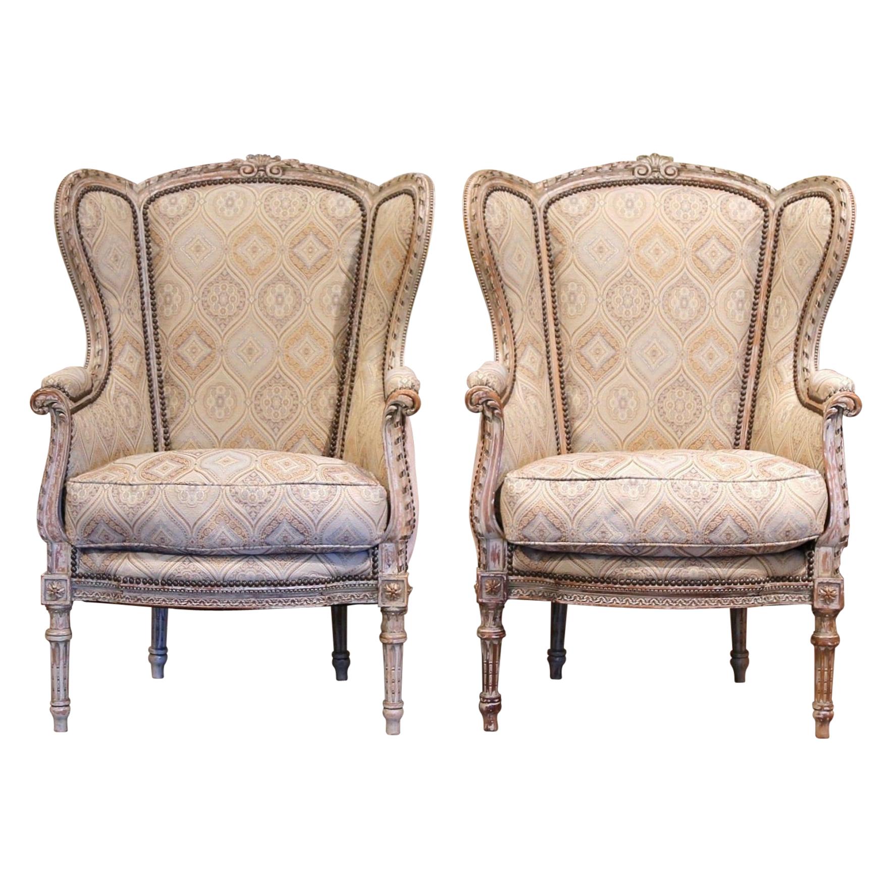 Paire de Fauteuils Louis XVI du 19ème siècle en forme d'oreille sculptés et peints en vente