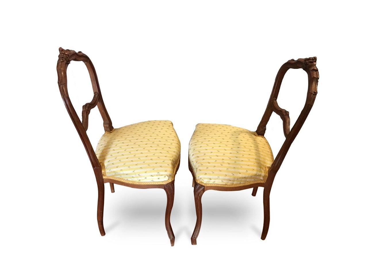 Early 19th century pair of small side chairs. Built in 19th century French period. Refine carved oakwood. Frame in good condition. Wear consistent with age.