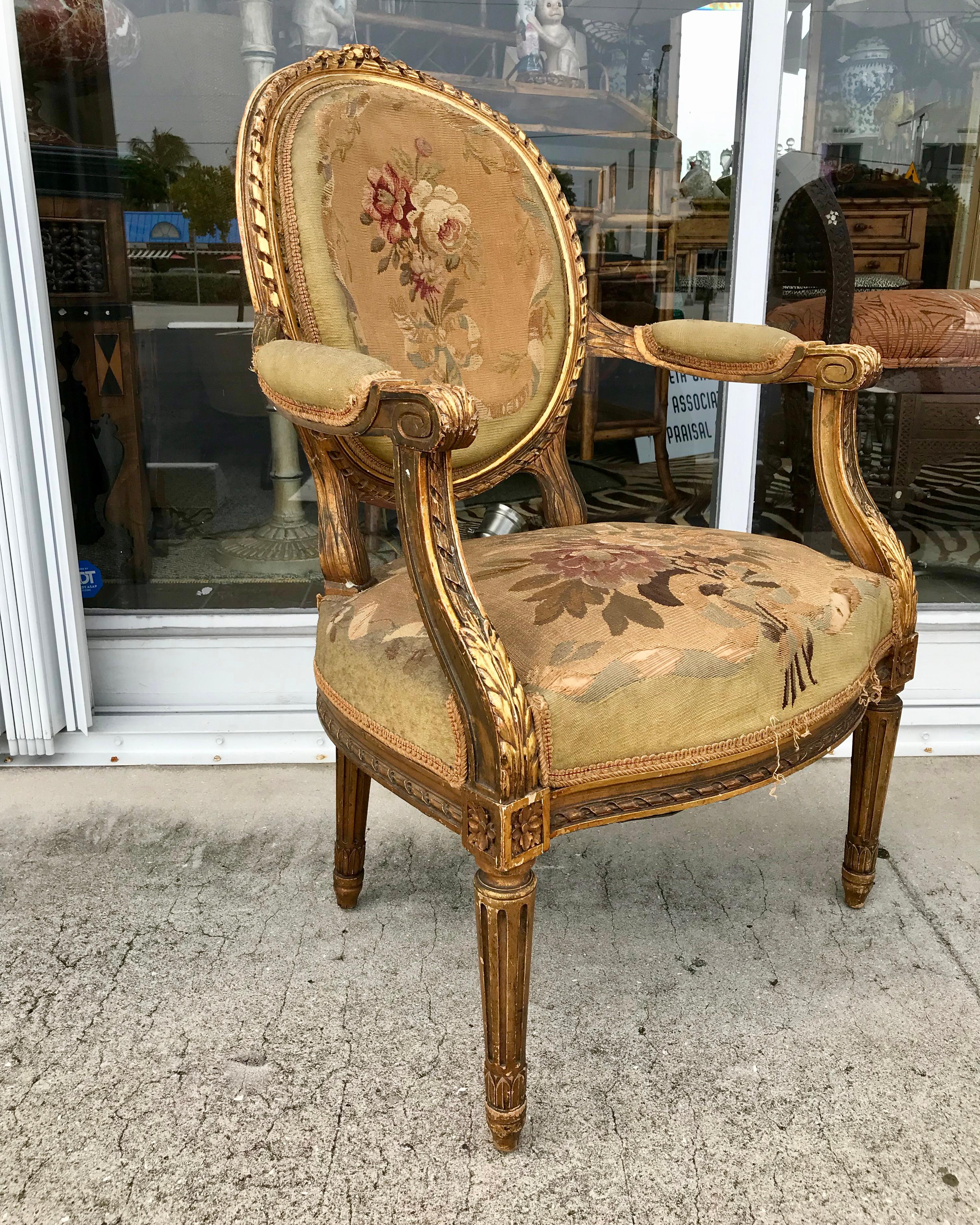 Pair of 19th Century Louis XVI Gilded Arm Chairs 1