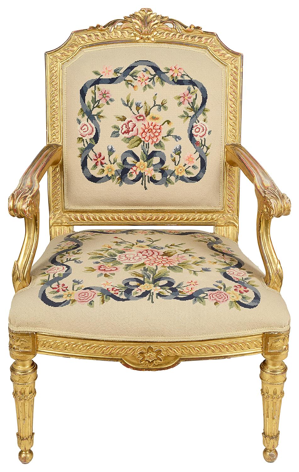 A good quality pair of late 19th century carved giltwood Louis XVI style salon chairs. Each with scroll and foliate decoration to the show wood frames, floral tapestry upholstery to the backs and seats, raised on turned tapering fluted legs.
 