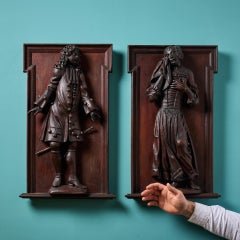 Pair of 19th Century Mahogany Relief Carvings of 18th Century Figures