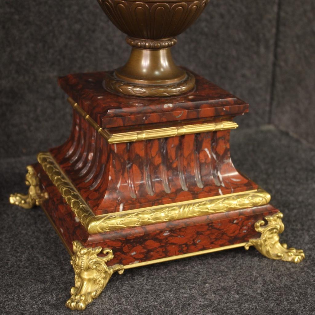 Pair of French candlesticks from the second half of the 19th century. Napoleon III period objects in red marble and gilt bronze of exceptional quality signed on the base F. Barbedienne (Ferdinand Barbedienne 1810-1892). Six-light candelabra resting