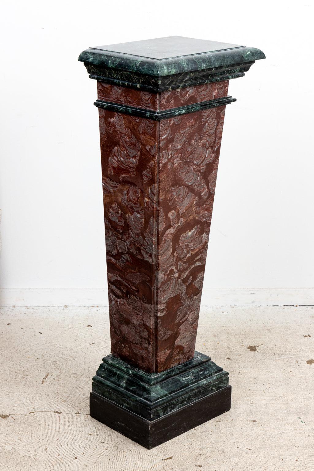 Pair of 19th century carved brown vein marble pedestals in the Neoclassical style. The pedestals feature duel colored marble and a tapered column base. Origin unknown. Please note of wear consistent with age.
