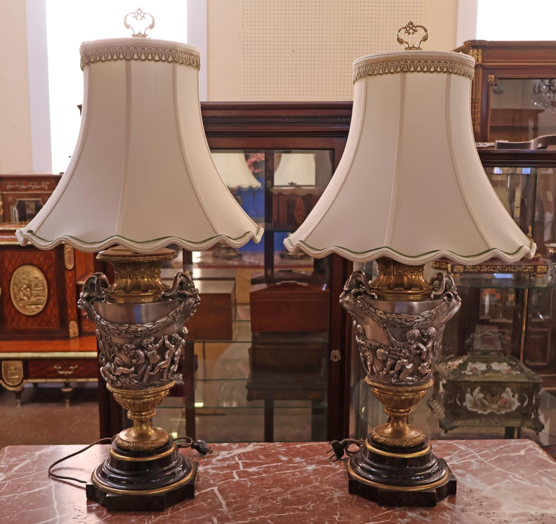 Pair of 19th Century Marble & Silvered Bronze French Bacchus Lamps After Clodion

Dimensions : With shades - 17 X 17 X 32