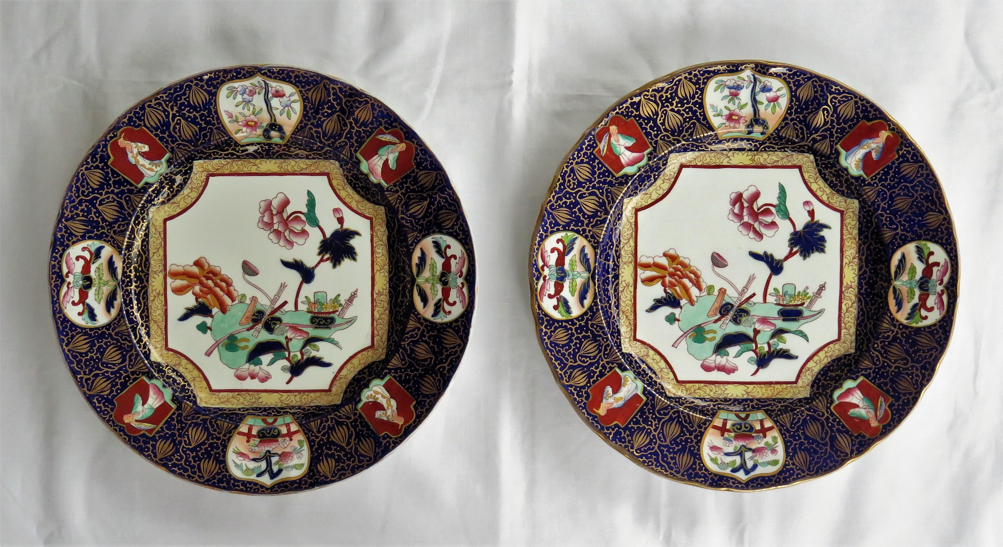 These are a beautiful pair of Mason's ironstone large Dinner Plates made during the mid-19th century, when Mason's was owned by Ashworth Brothers, circa 1870.

The plates have a very detailed Chinoiserie pattern depicting a central octagonal panel,