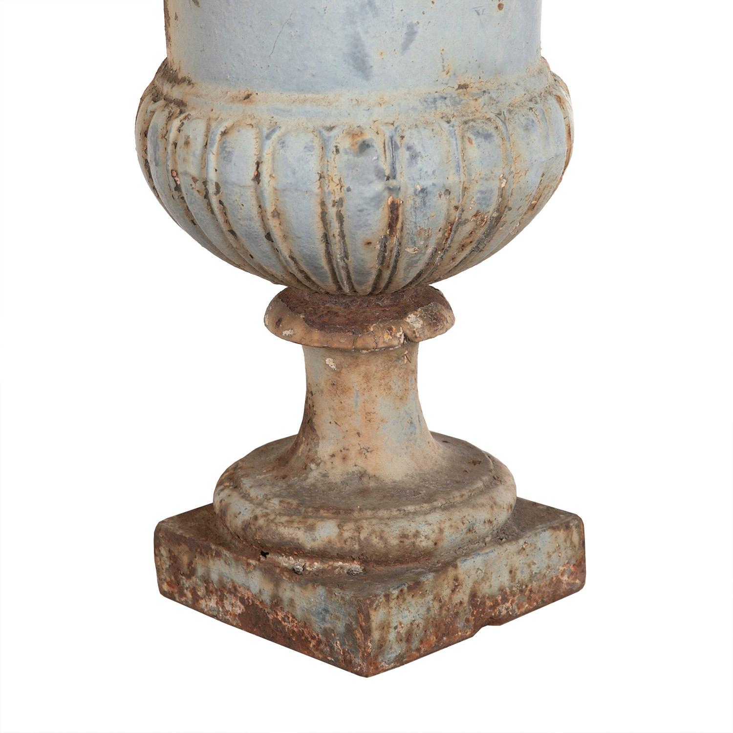 Pair of 19th century French Medici urns of good shape. These urns have a great weathered patina.