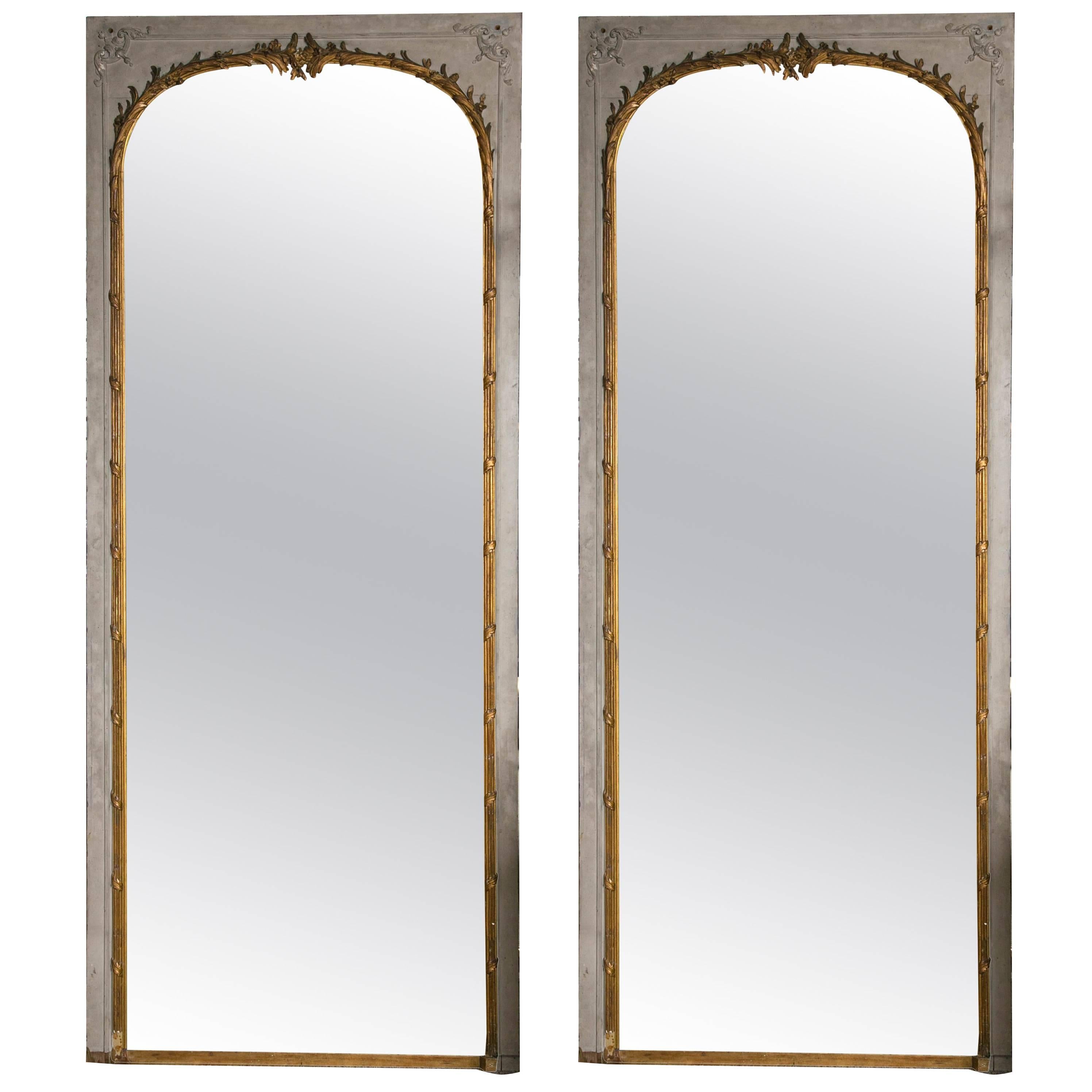 Pair of 19th Century Monumental Parcel Gilt and Paint Decorated Trumeau Mirrors