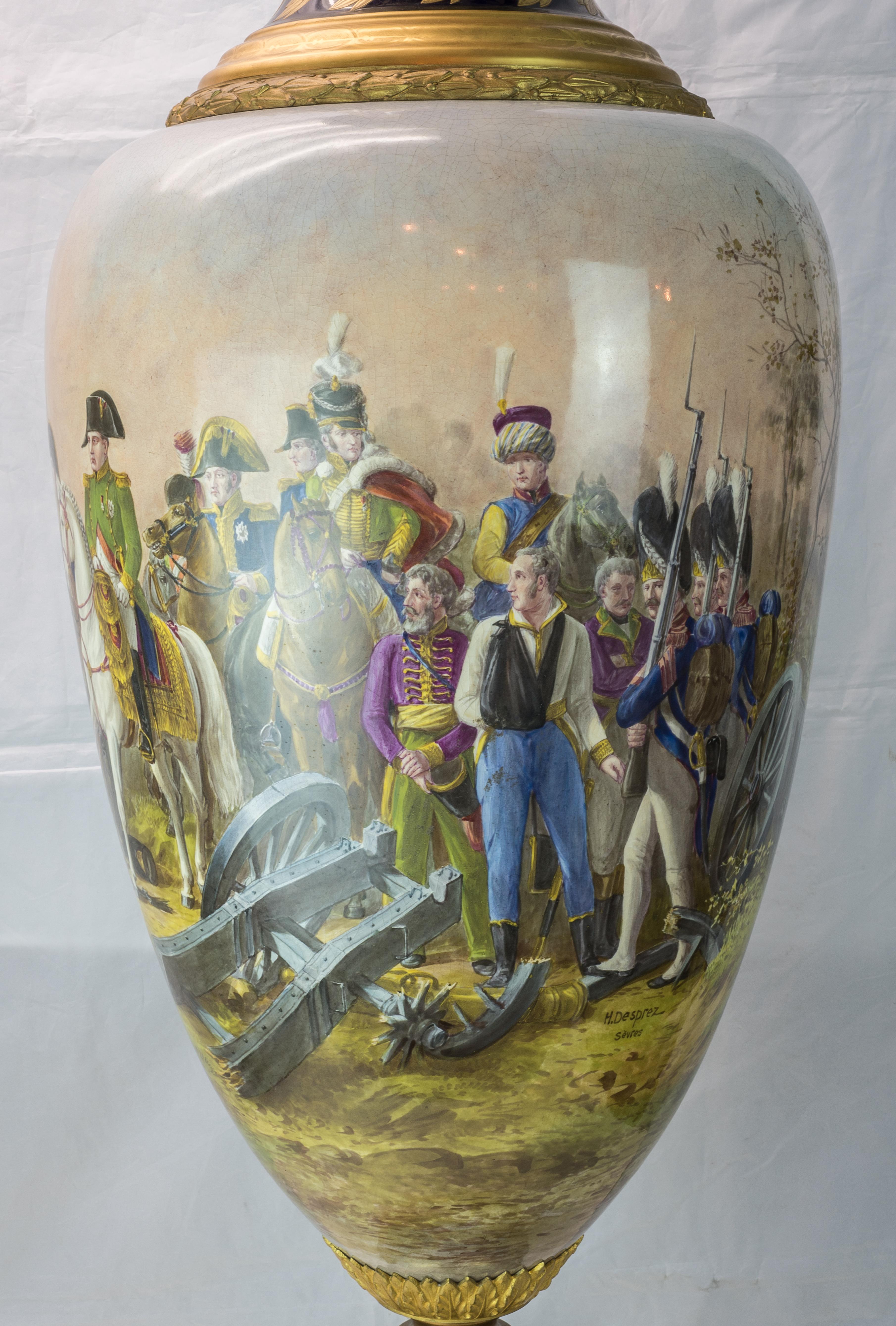 Monumental Pair of Sèvres style Porcelain hand painted cobalt ground Napoleonic vases and cover
The bodies well-painted to show cavalry scenes from the Napoleonic wars, the necks with large crowned initial 