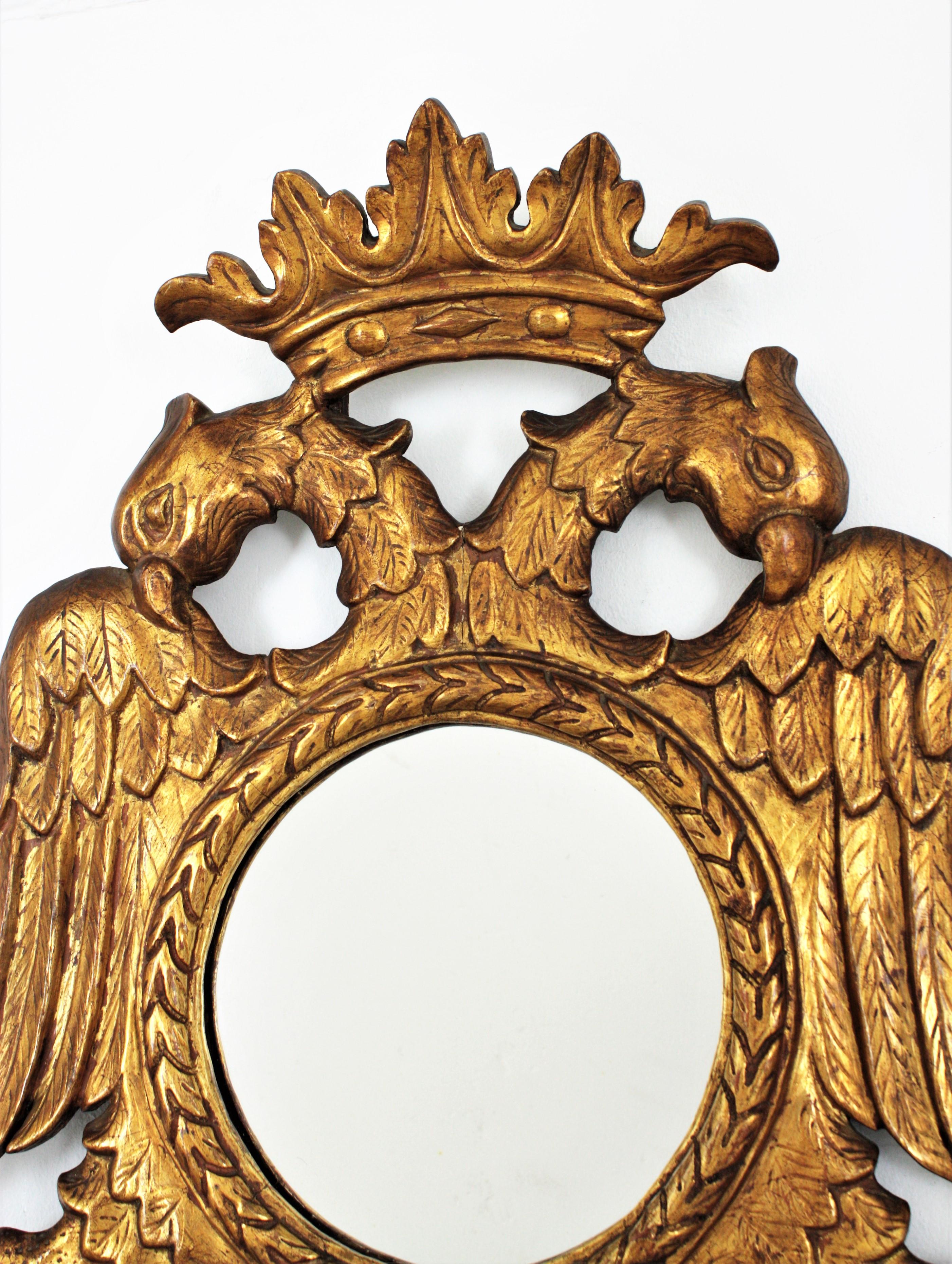 Spanish Pair of 19th Century Neoclassical Carved Giltwood Double Headed Eagle Mirrors