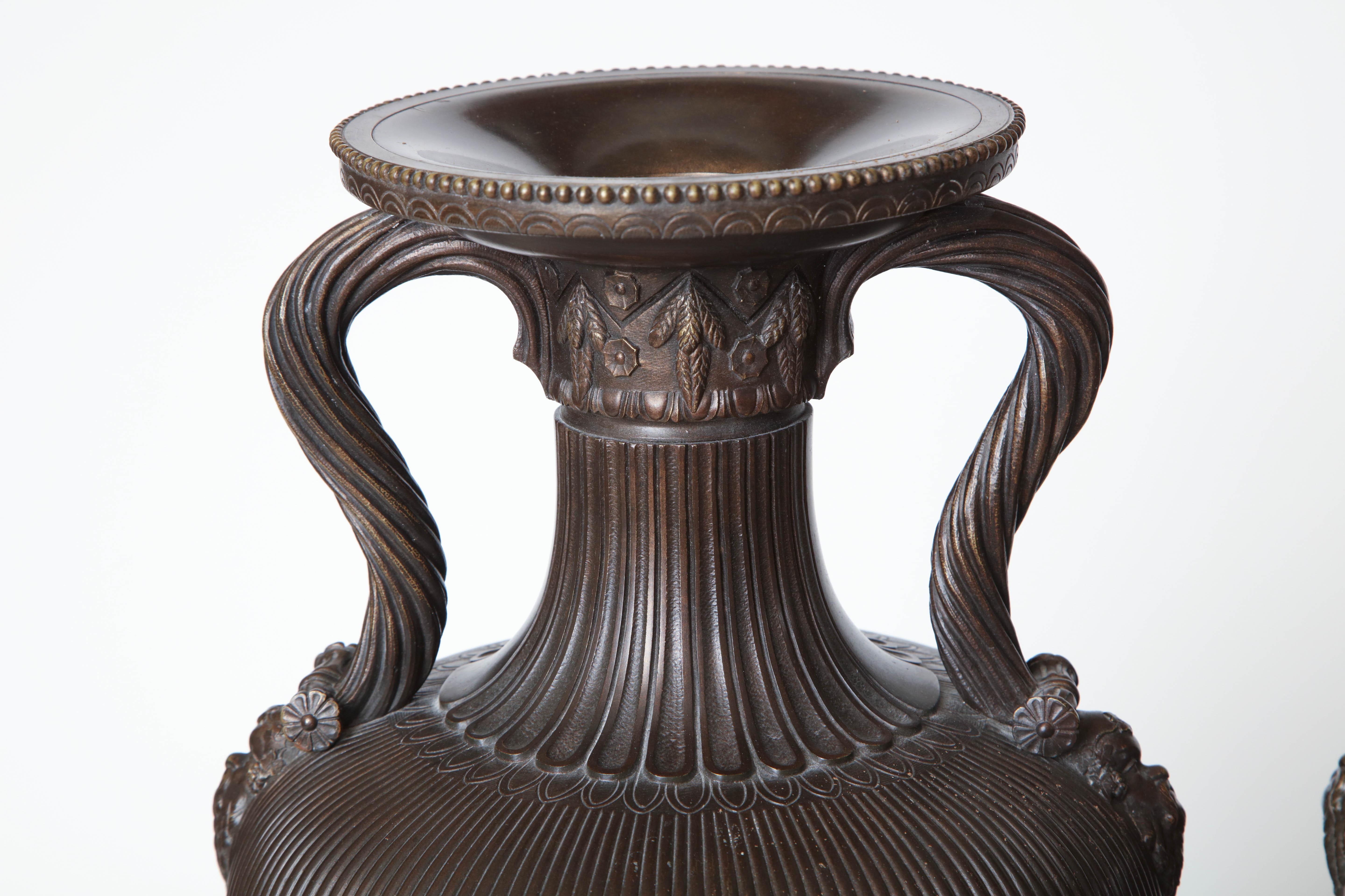Pair of 19th Century Neoclassical, French, Bronze Urns on Marble Bases In Good Condition For Sale In New York, NY