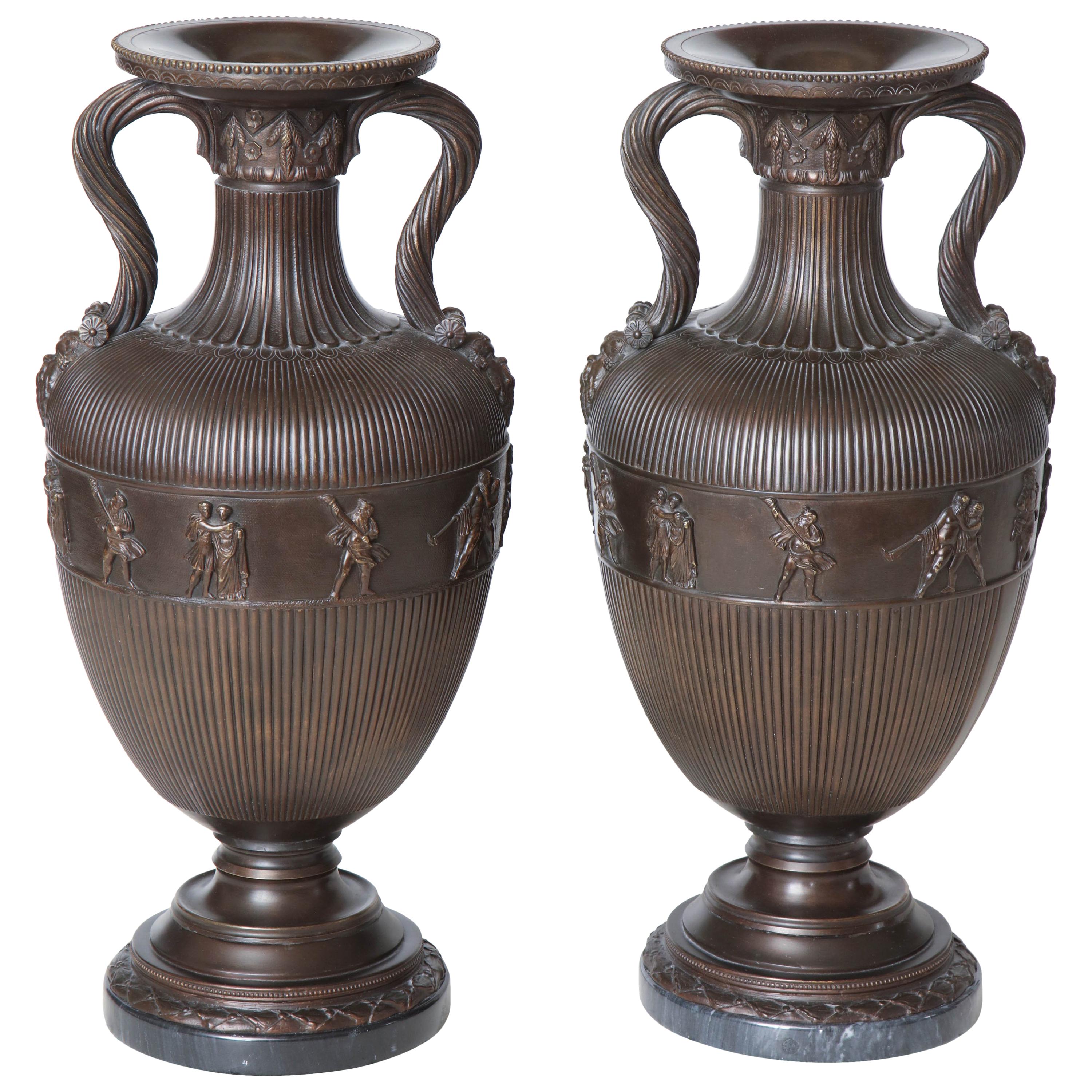 Pair of 19th Century Neoclassical, French, Bronze Urns on Marble Bases For Sale