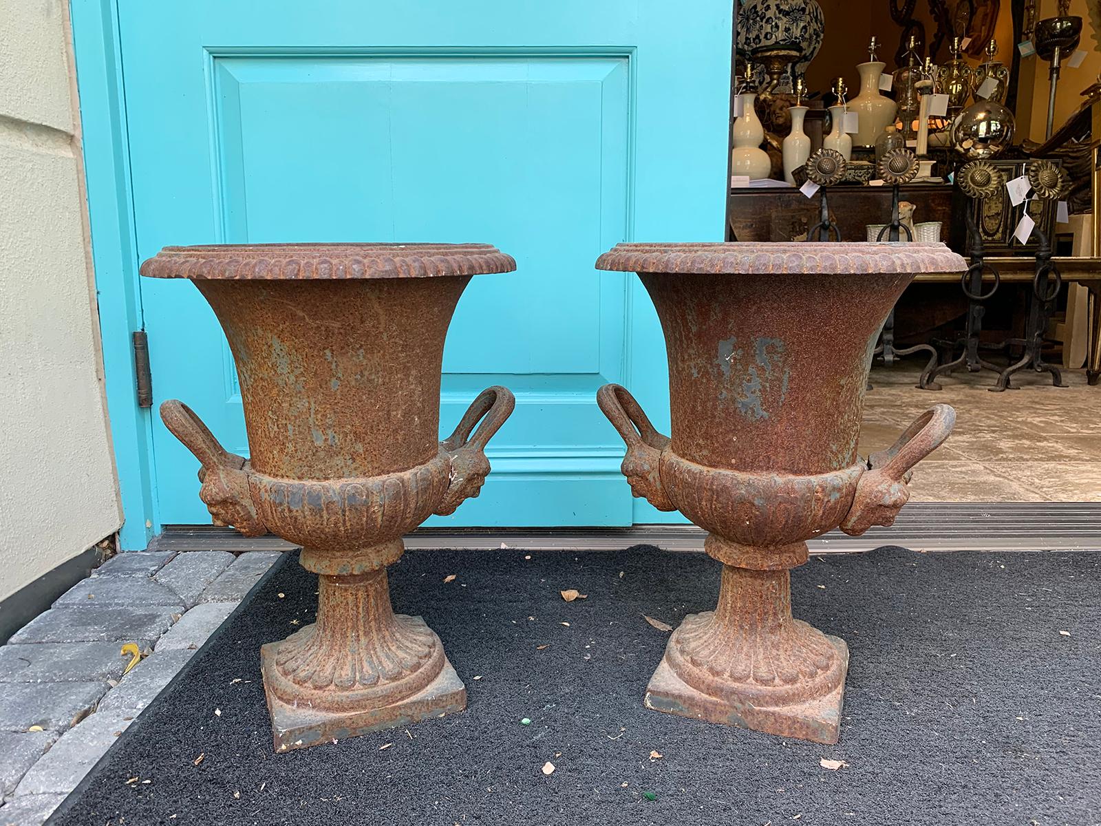 Pair of 19th Century Neoclassical Iron Urns with Handles and Face Detail For Sale 6