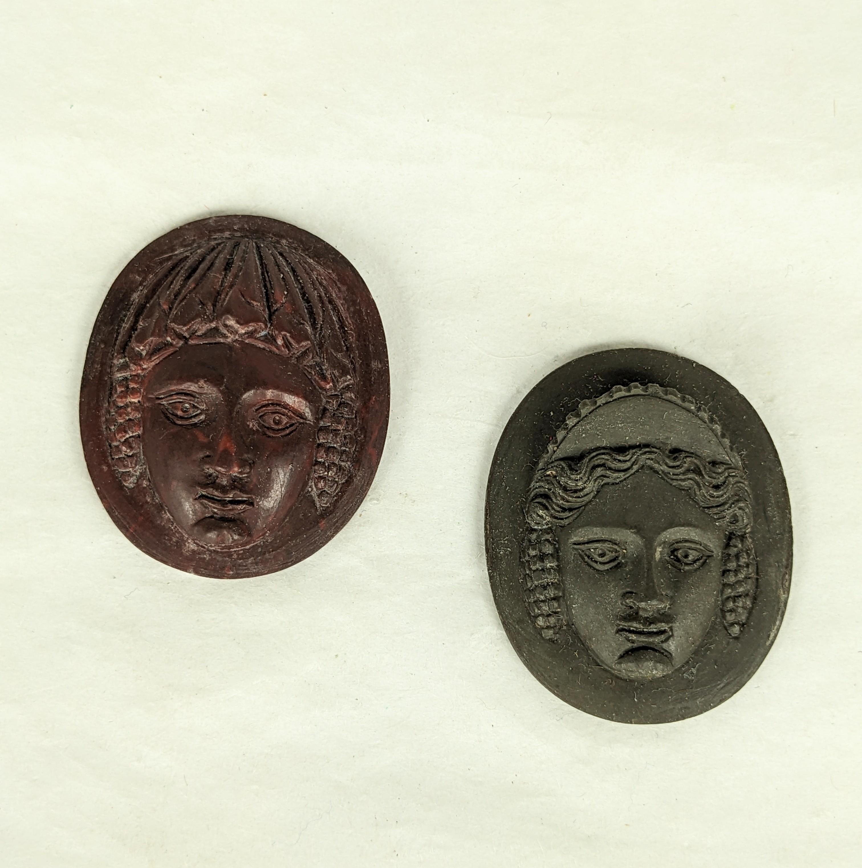 Pair of Hand Carved Neoclassical Lava Unmounted Cameos from the 19th Century, Italy. Almost identical in carving (different crowns), these would work beautifully set as a pair of earrings. One in deep brick lava, the other in deep grey green. 19th
