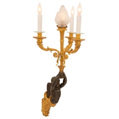 Pair of 19th Century Neoclassical Style Ormolu and Patinated Bronze Sconces