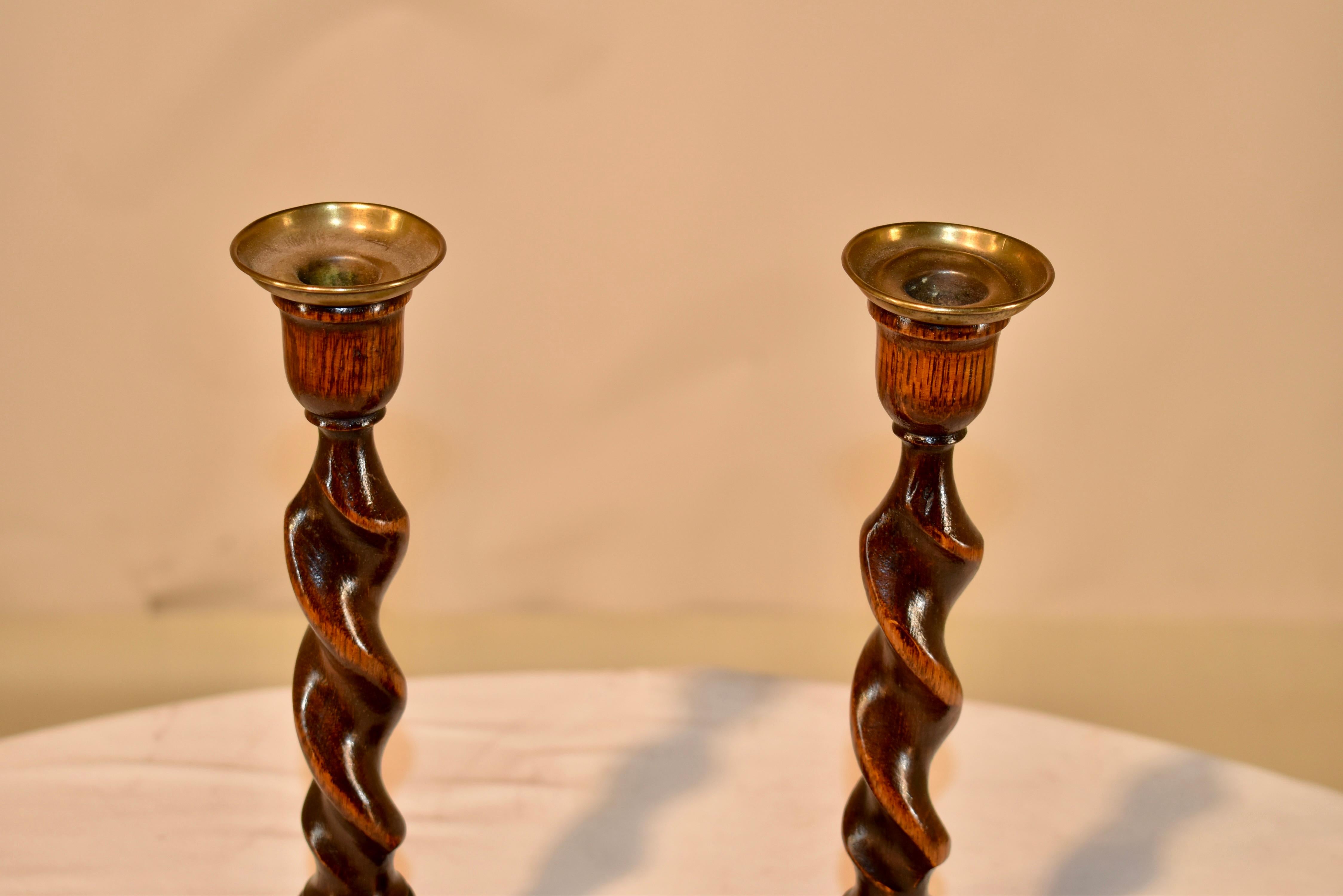 Brass Pair of 19th Century Oak Candlesticks For Sale