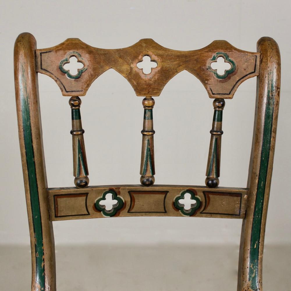 A delightful, mid-19th century, original Gothic painted, pair of rush seated side chairs. In good condition, a couple of strands of rush missing off each chair, but the seats are sturdy.

English, circa 1860.