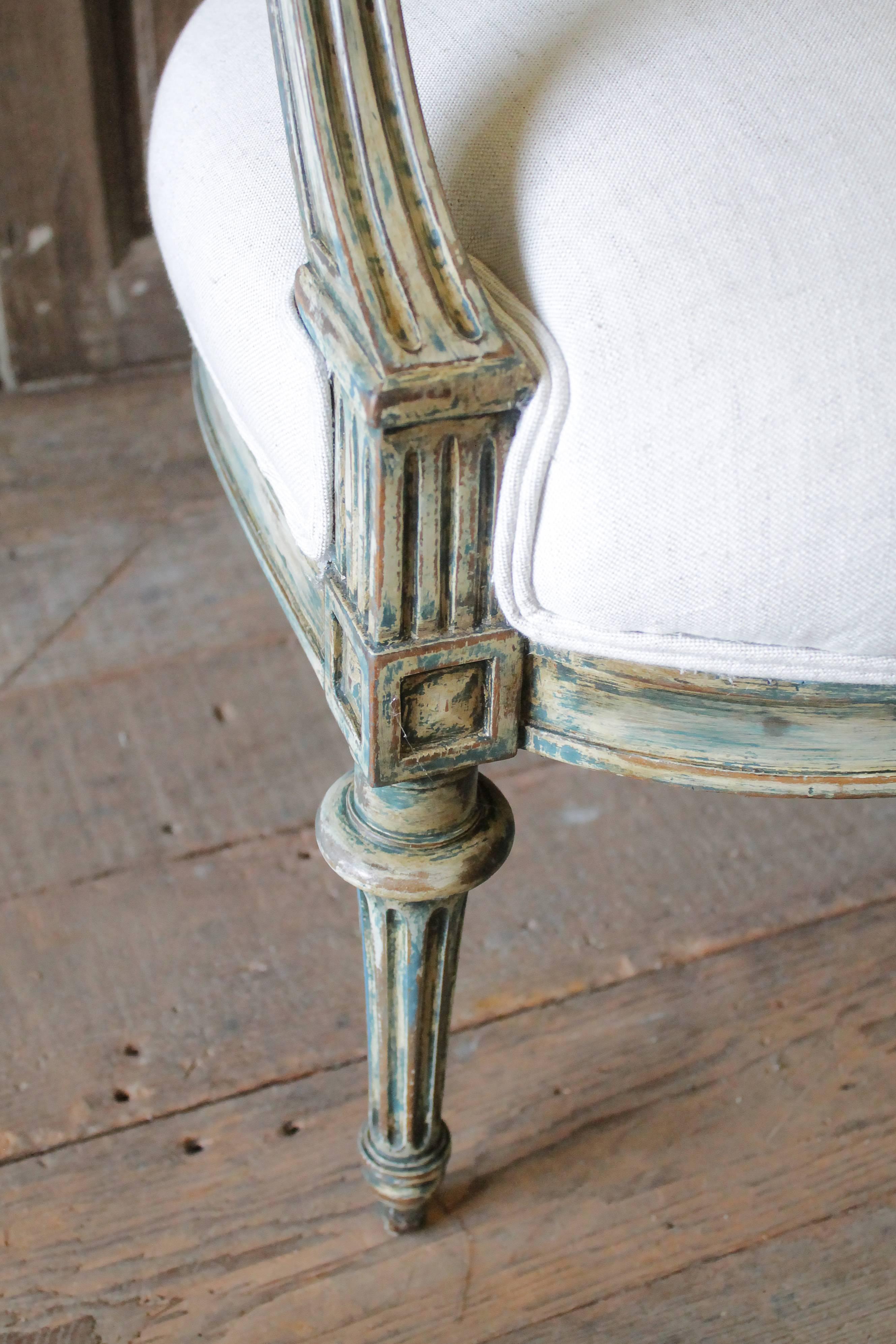 Hand-Carved Pair of 19th Century Painted and Upholstered Louis XVI Style Open Armchairs